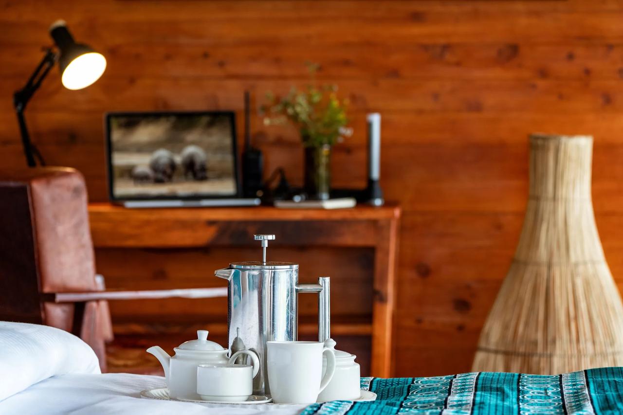 Morning coffee arrives at the tent