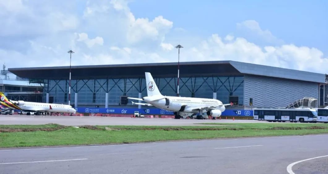 A Uganda Airlines jet stands at the Entebbe terminal