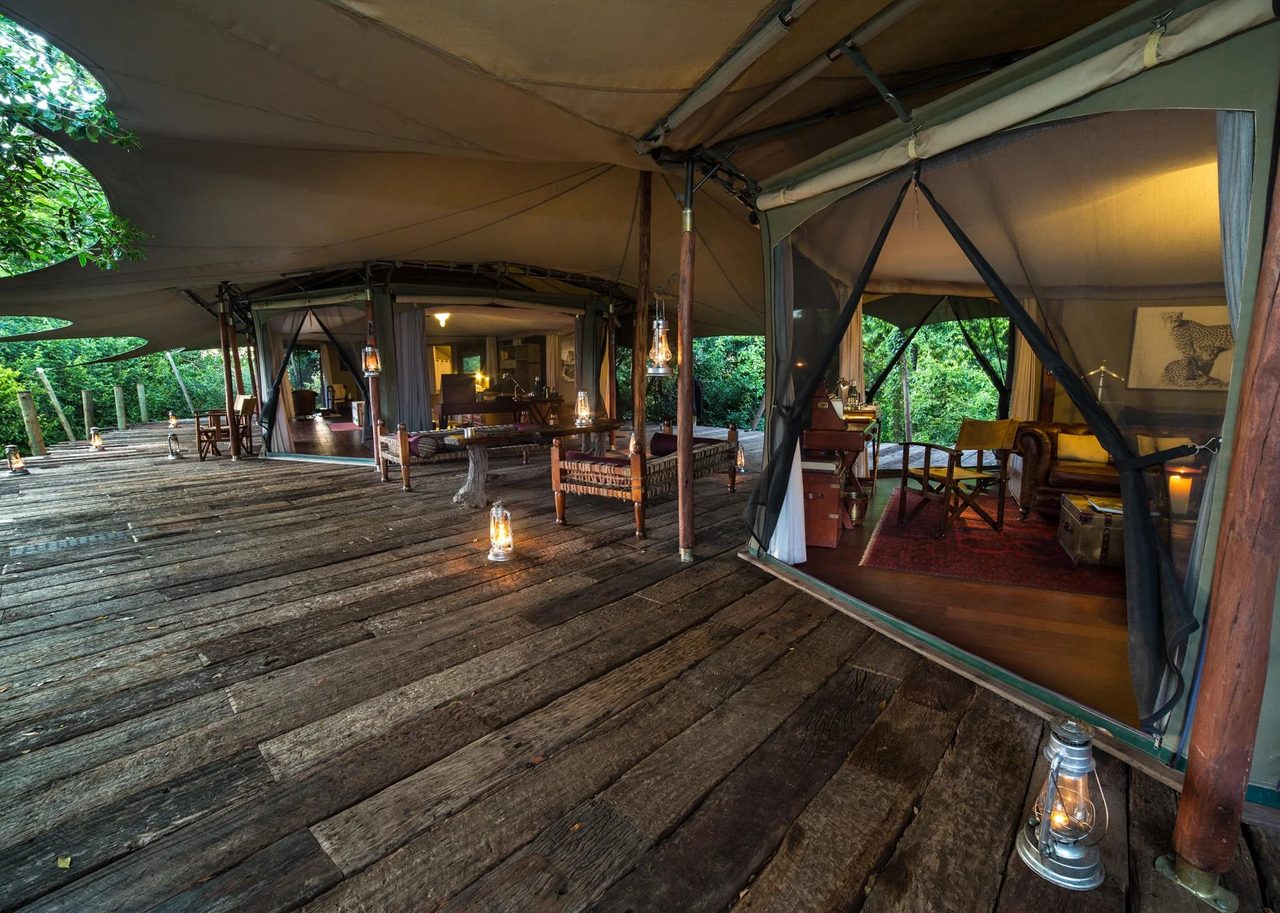 A level boardwalk runs through a spacious tent suite