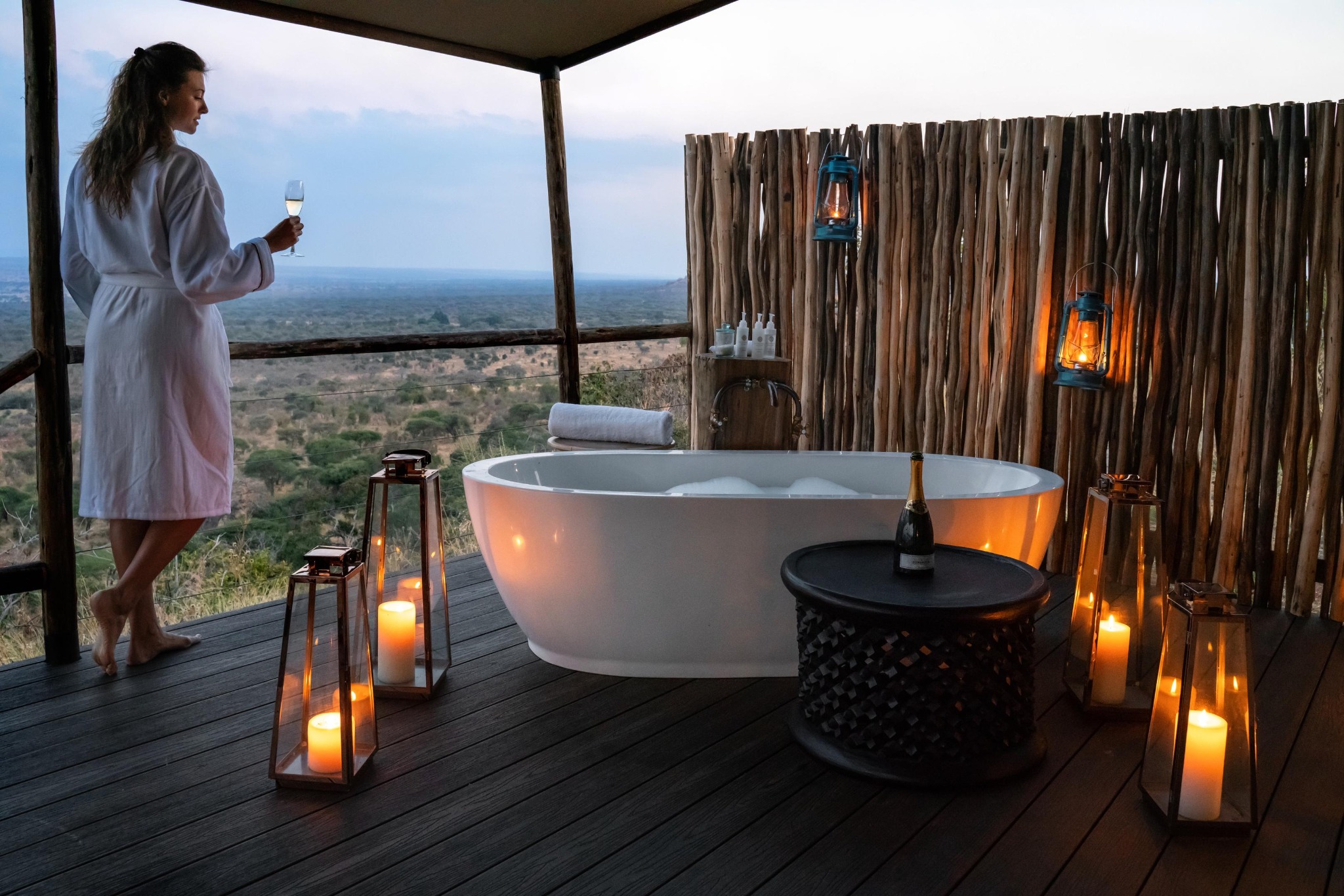 Candlelit bath overlooking the wilderness