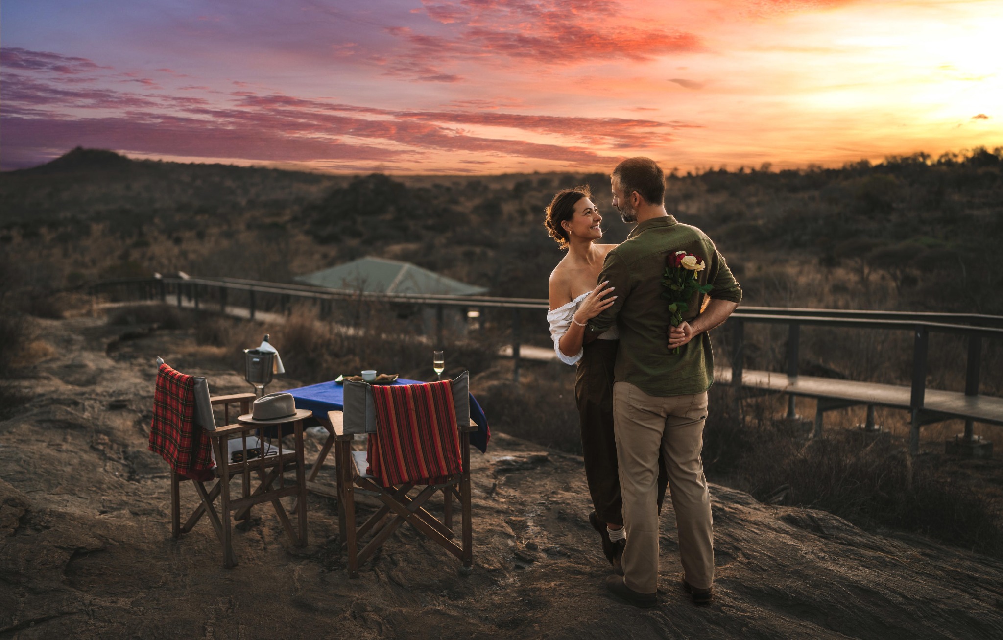 A couple watching sunset on an East African journey
