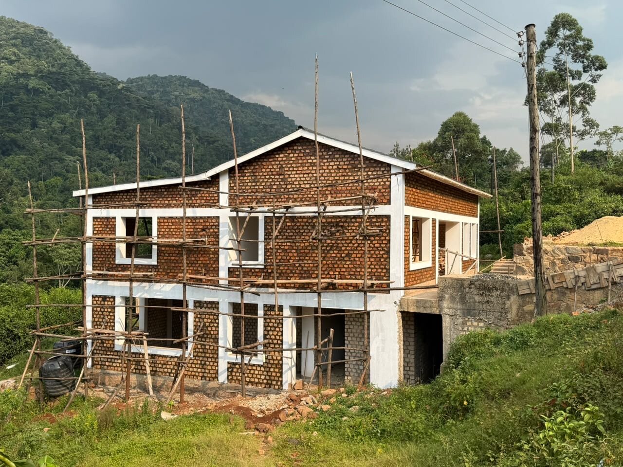 Construction progress at the Batwa Clinic project in Bwindi