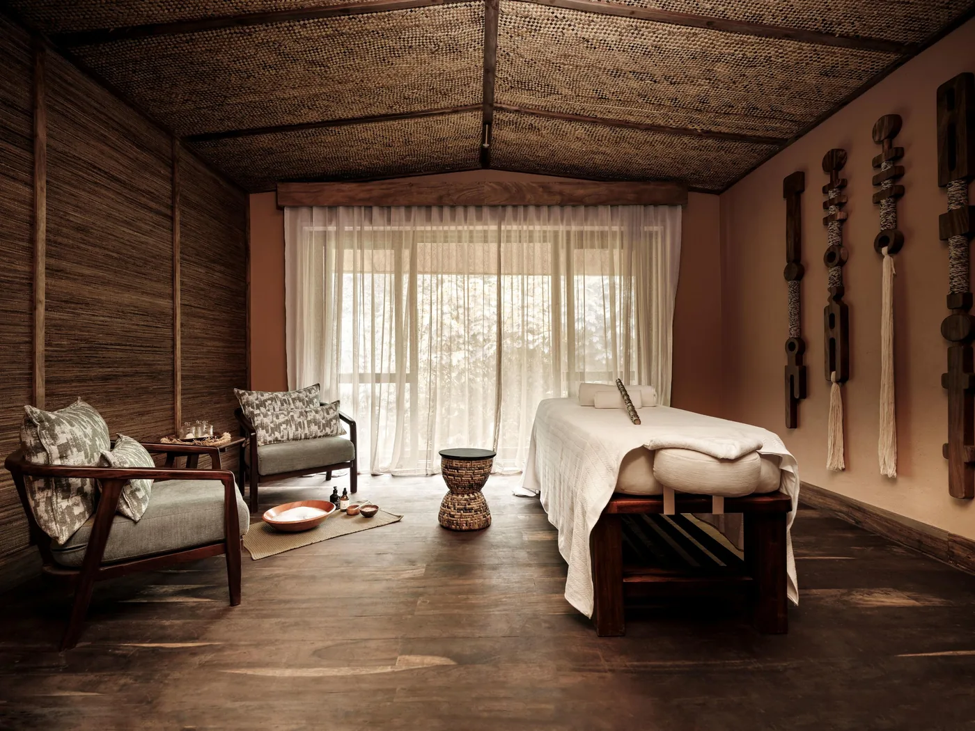 A treatment room opens to the forest light