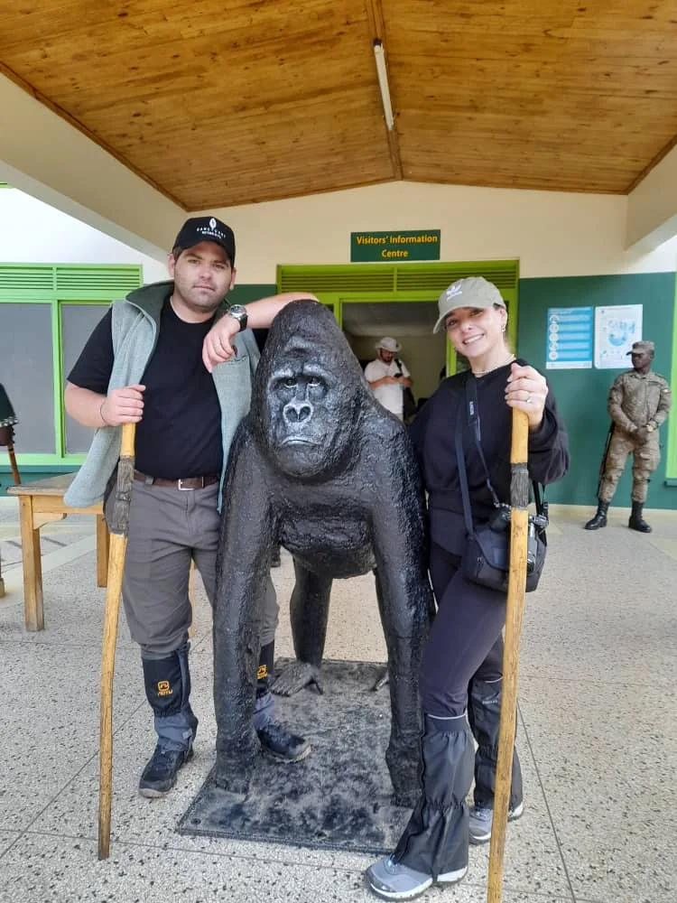 Guests stand with rangers at the park headquarters