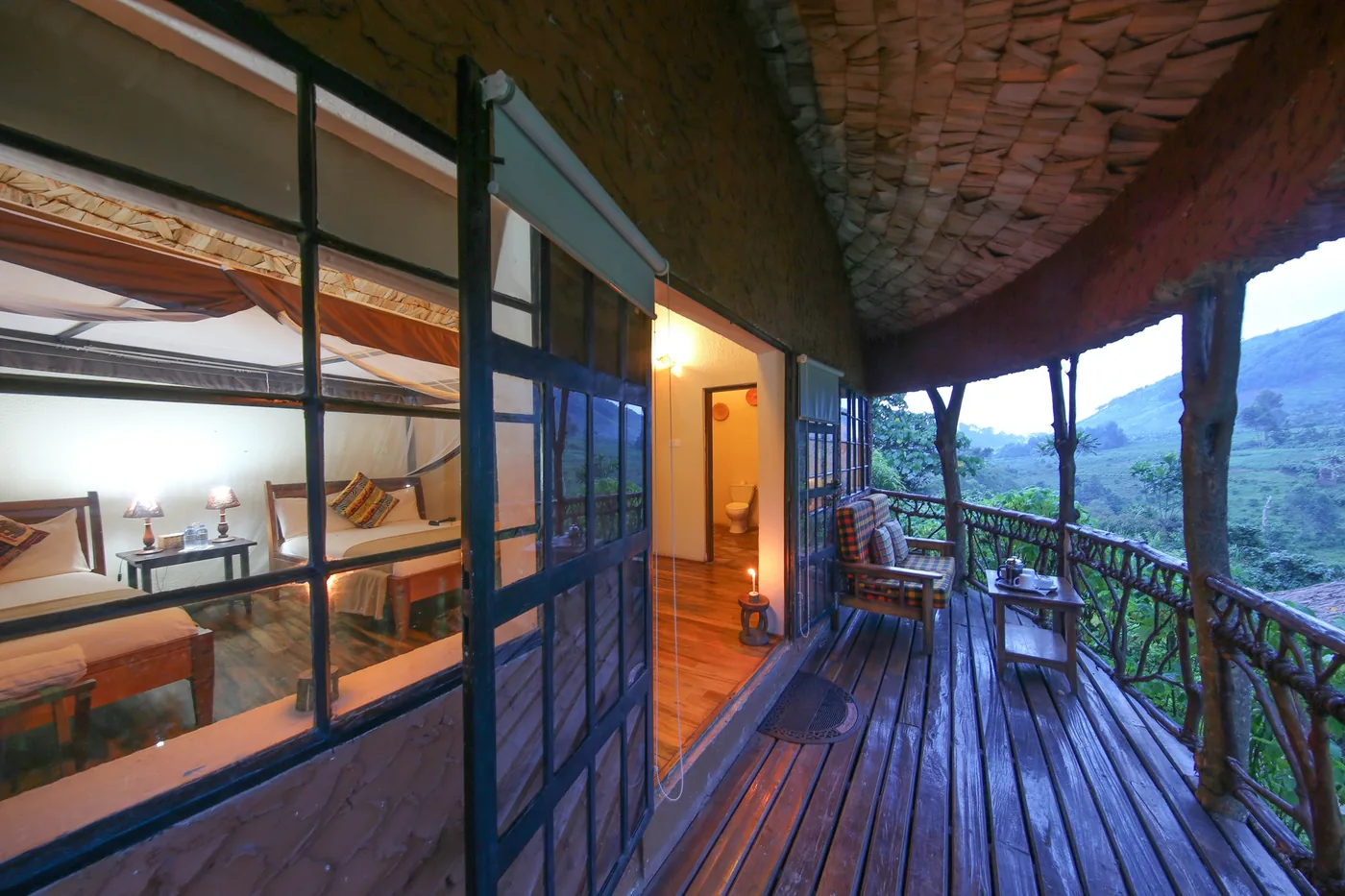 A private suite terrace opens to the forest