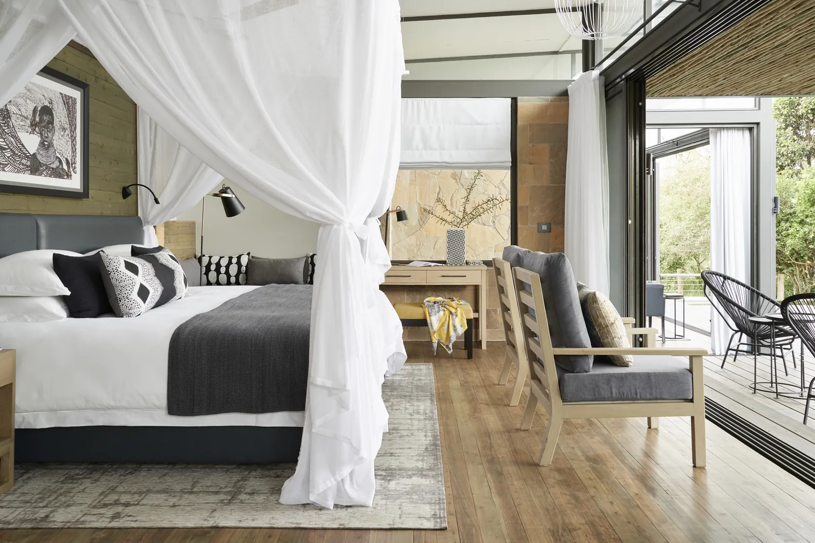 A river-line suite in white linen and wide netting