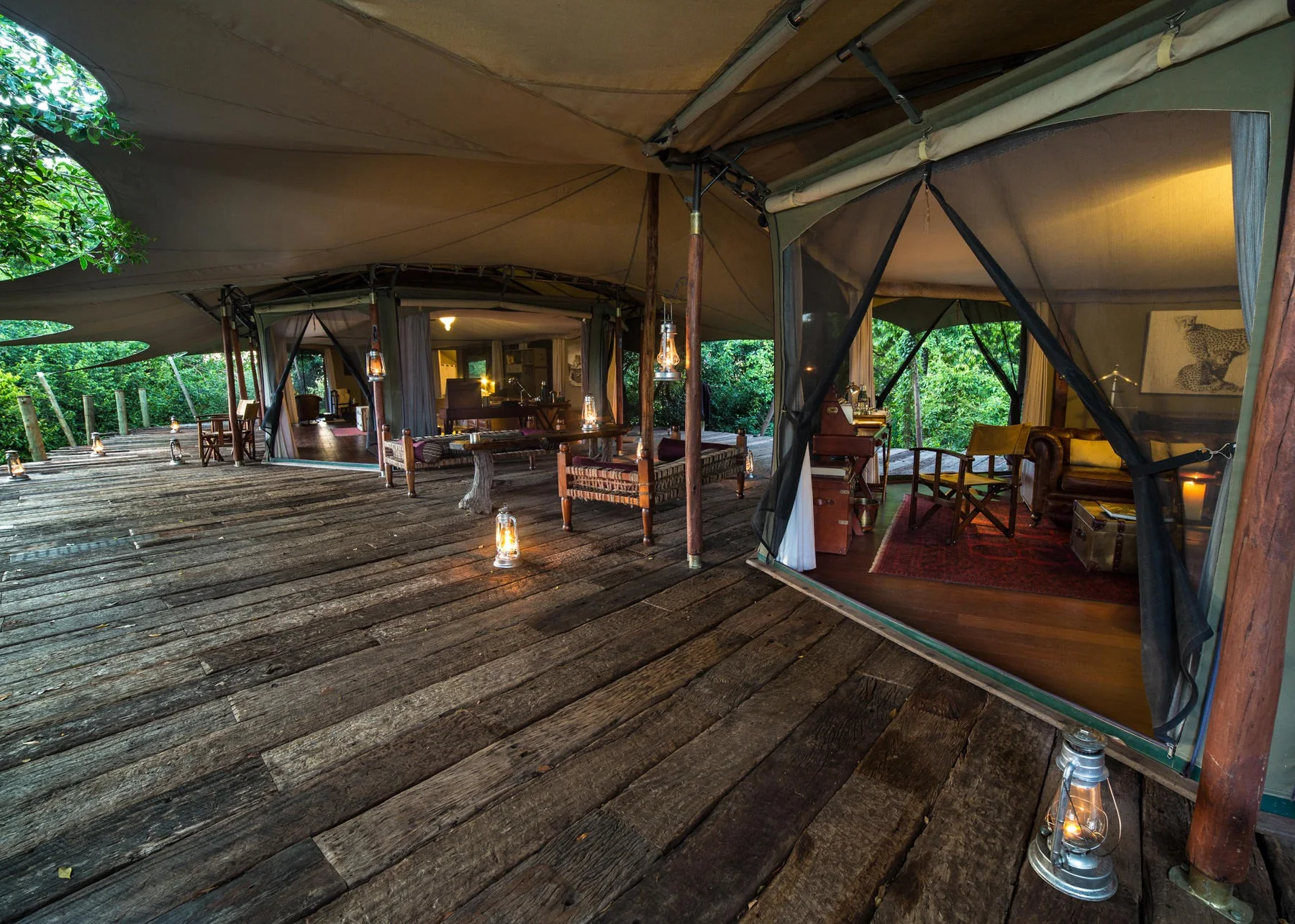 A level boardwalk runs through a spacious tent suite