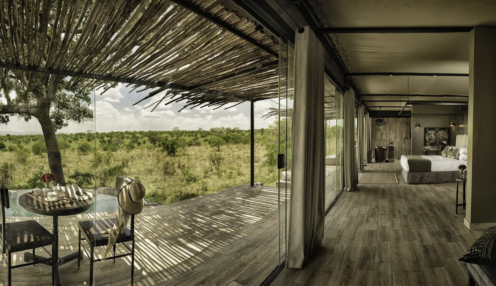 A level-floored suite opens onto its dining deck