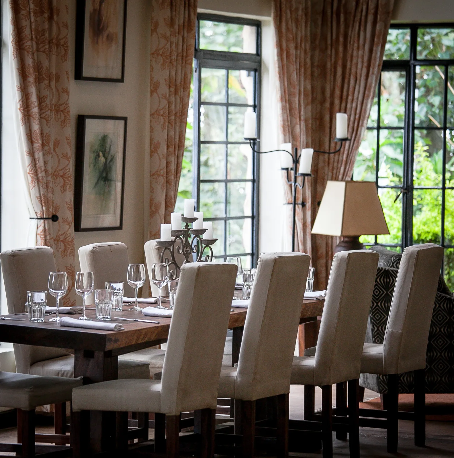 A bright dining room waits behind cottage windows