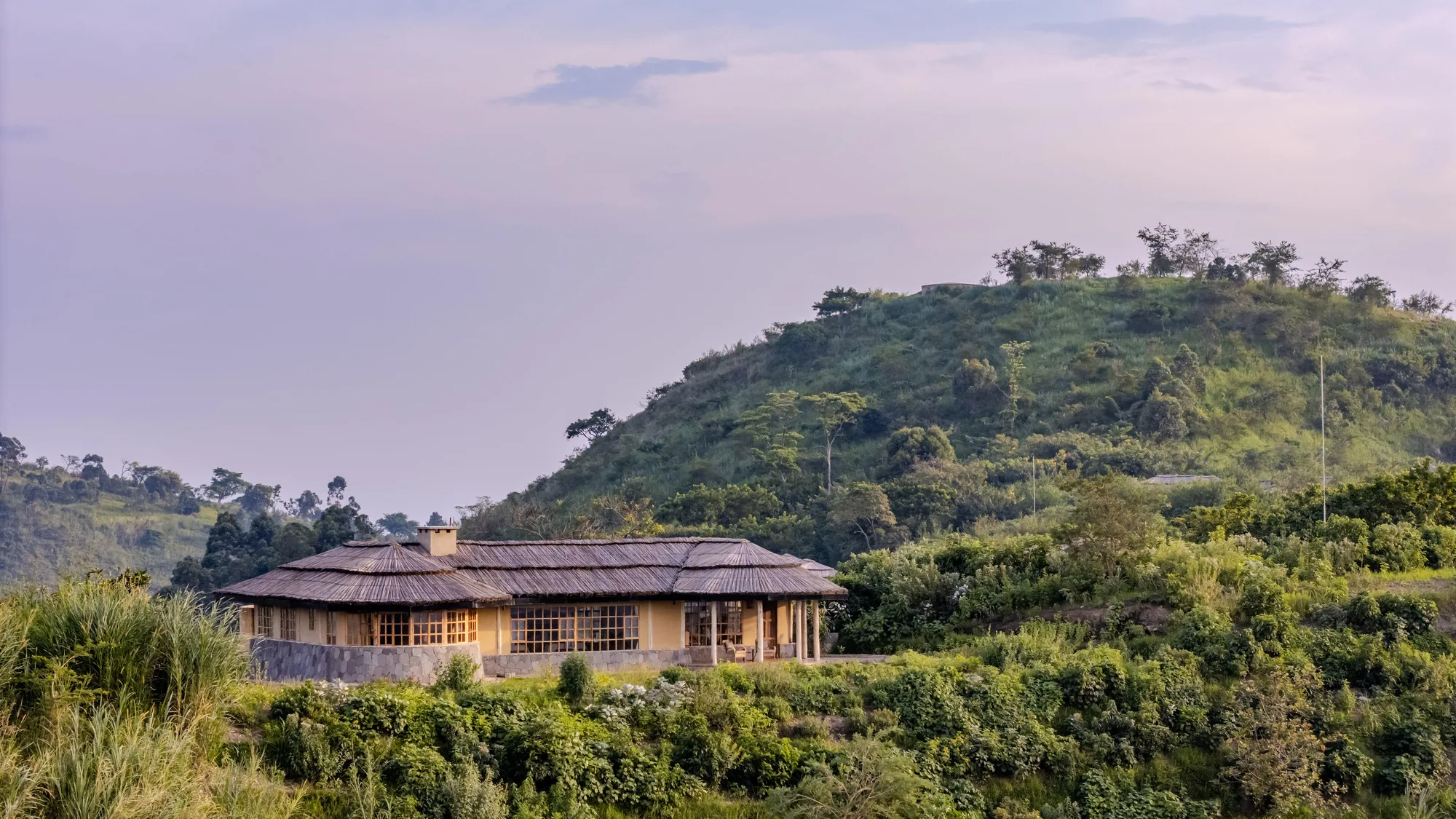 Green season closes over a forest lodge in western Uganda