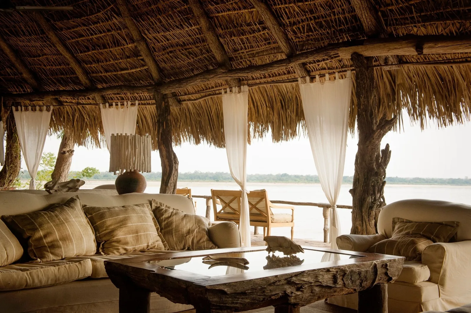 An open camp lounge looks over the Rufiji's channel country