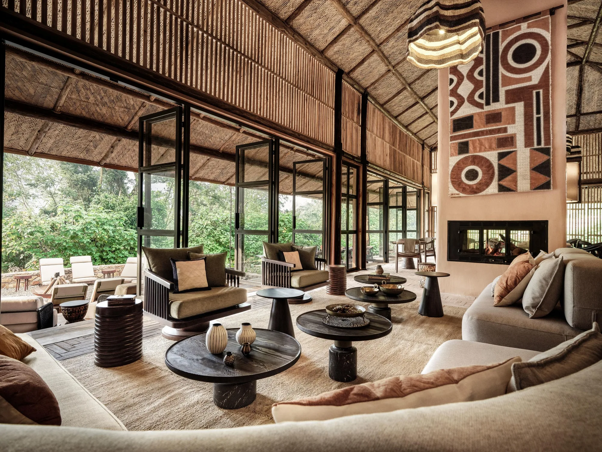 The lounge of a forest lodge, quiet before arrivals