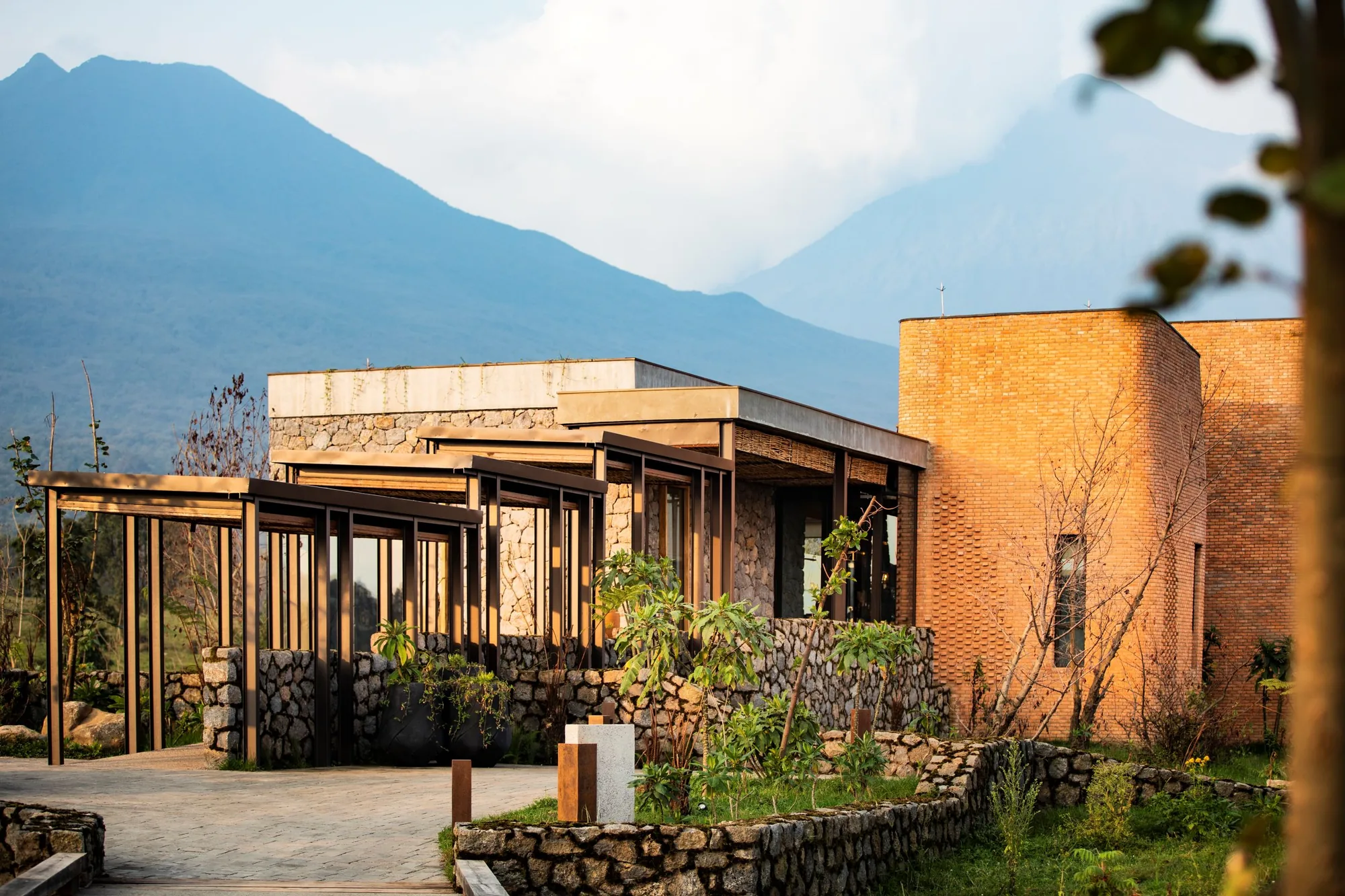 A lodge suite sits beneath the Virunga volcanoes