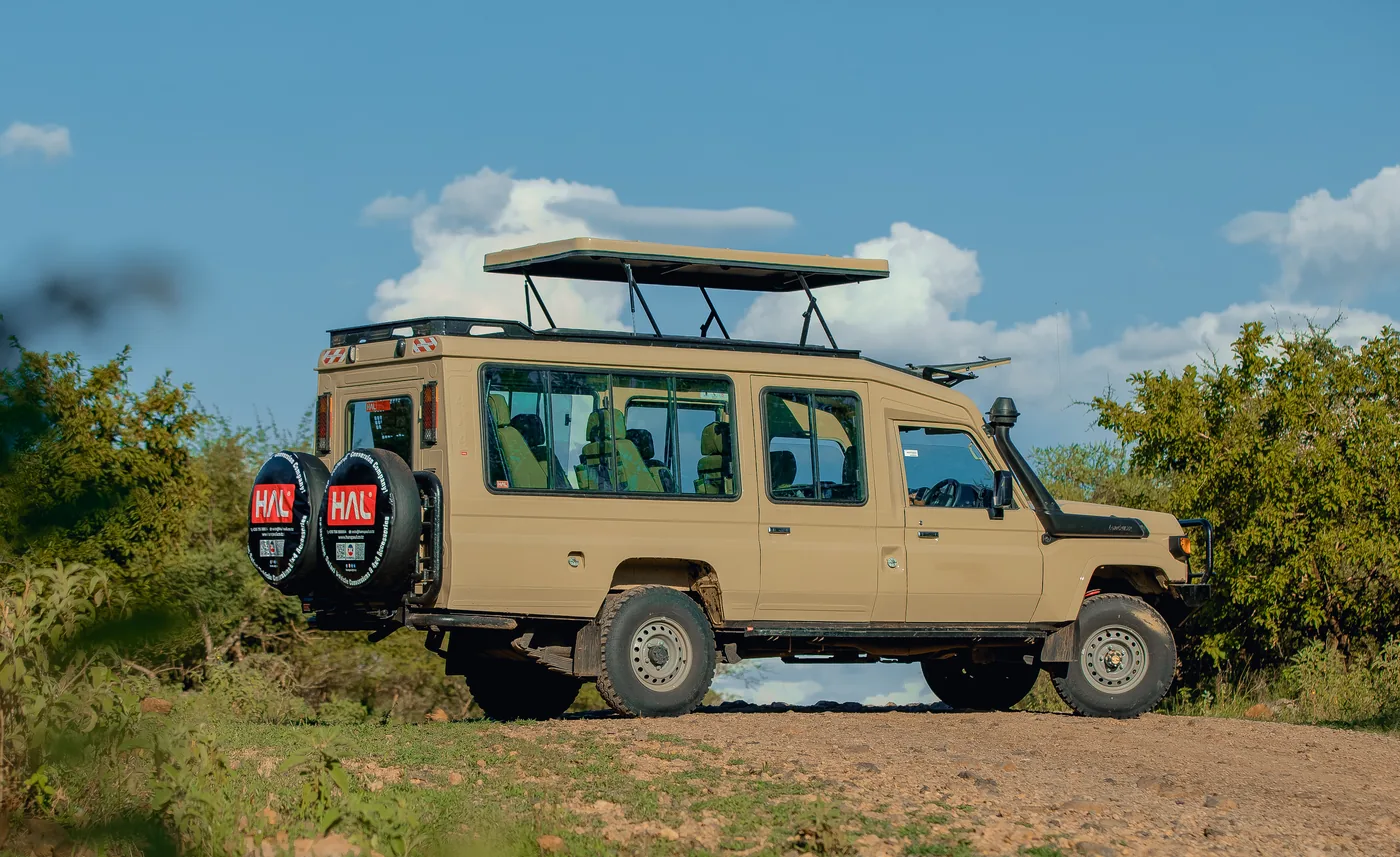 A safari cruiser stands prepared on the track
