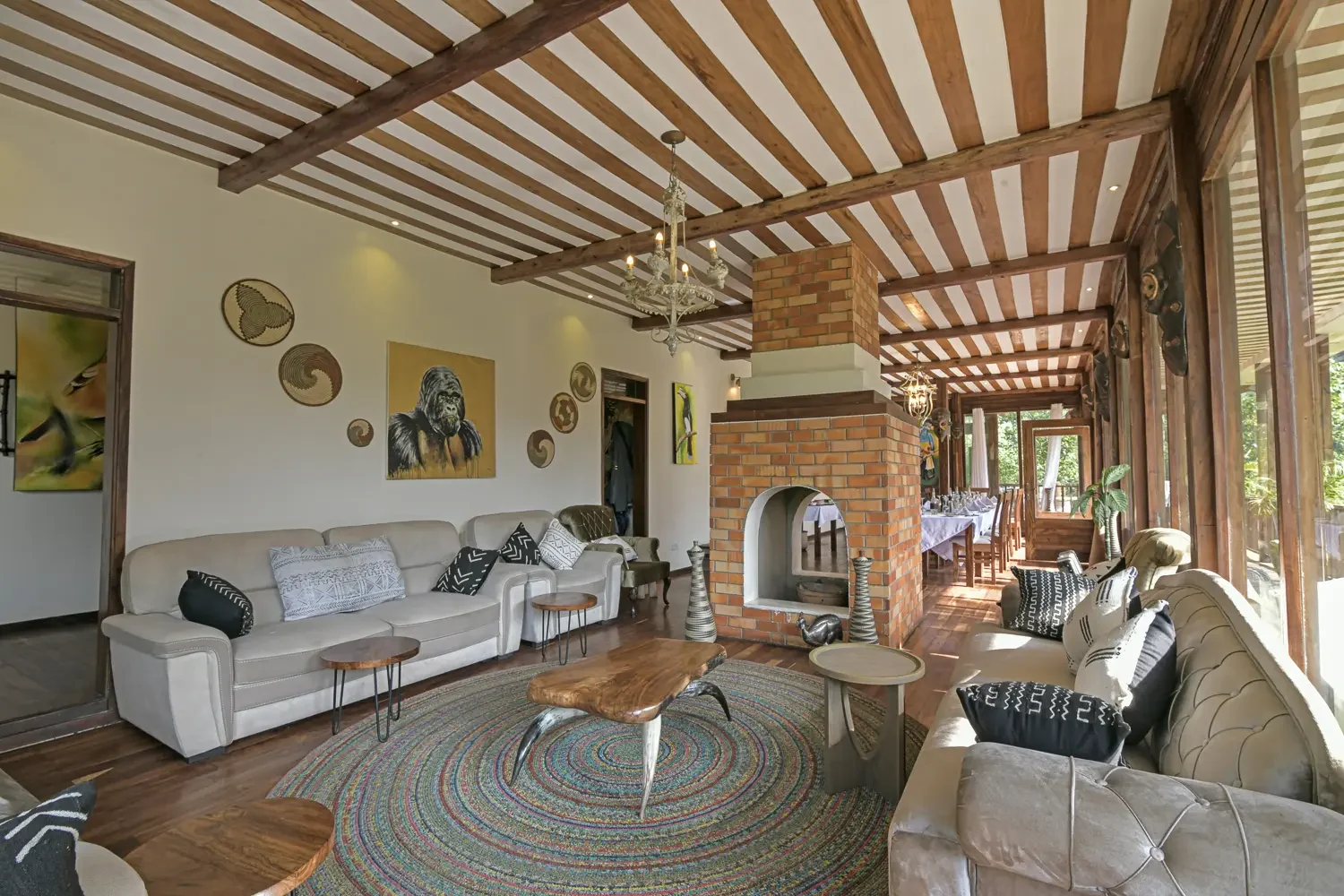 The lounge with a fireplace and woven rugs