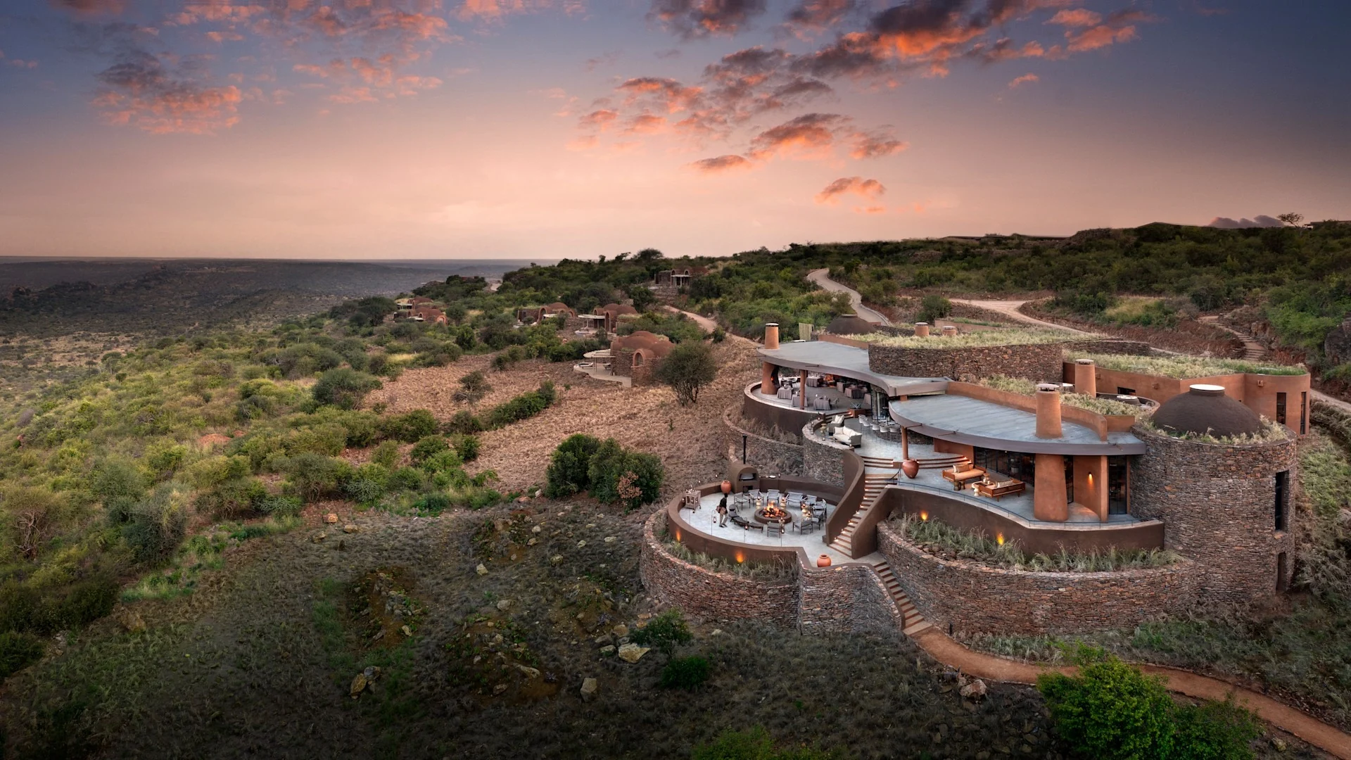 The lodge on its ridge at dusk