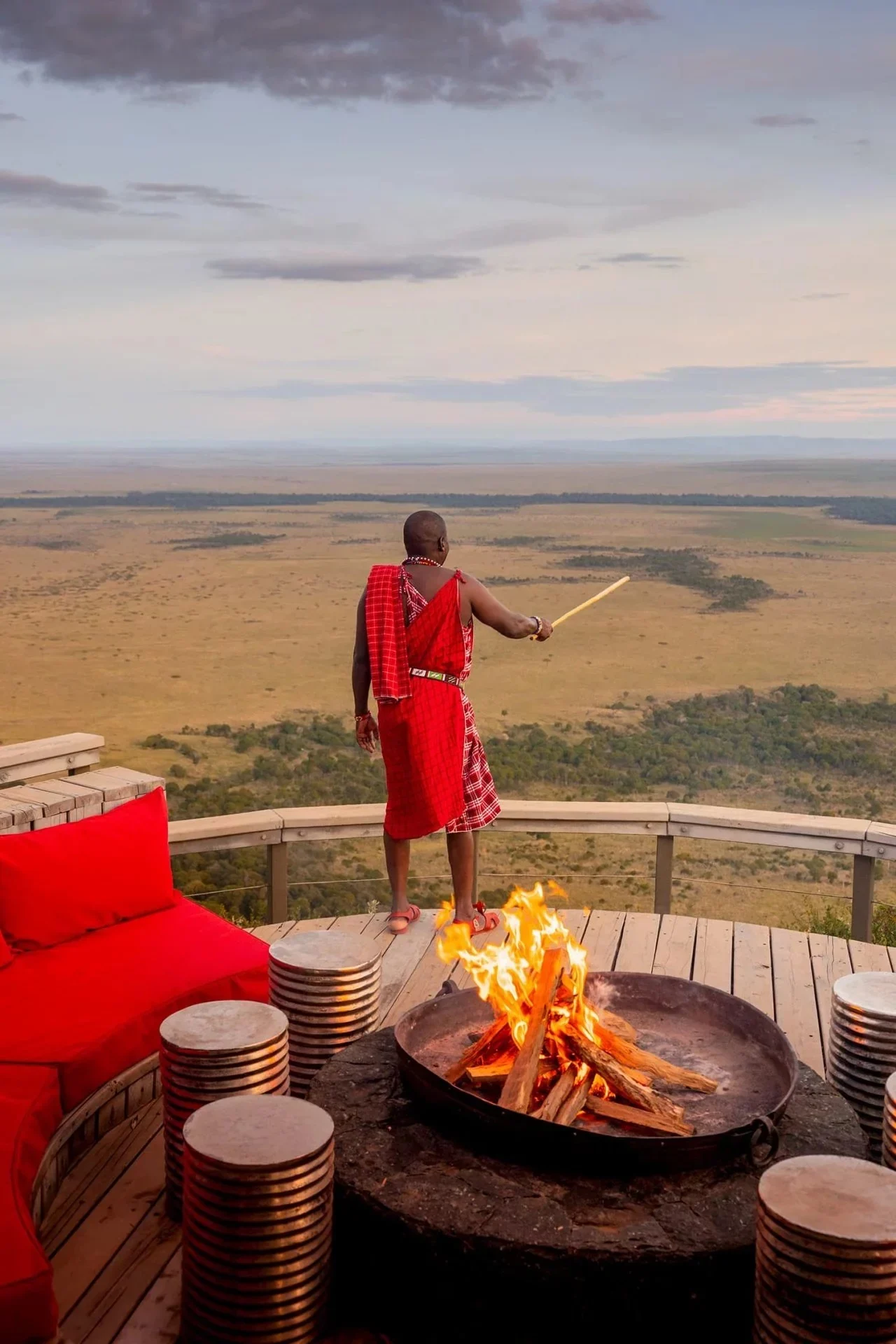A Maasai guide at the fire deck above the plains