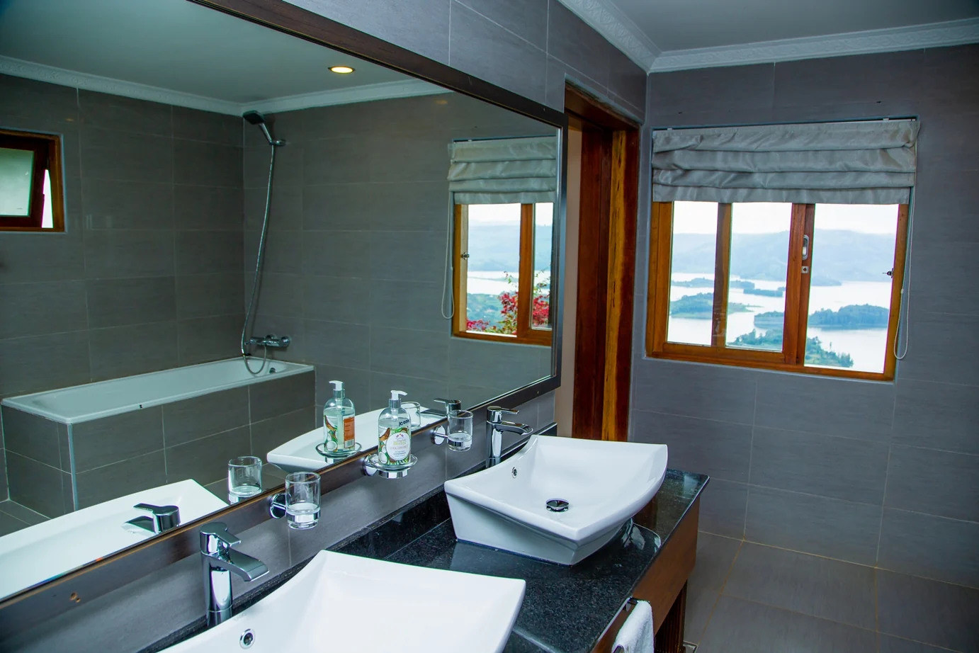 A bathroom with a window onto the lake
