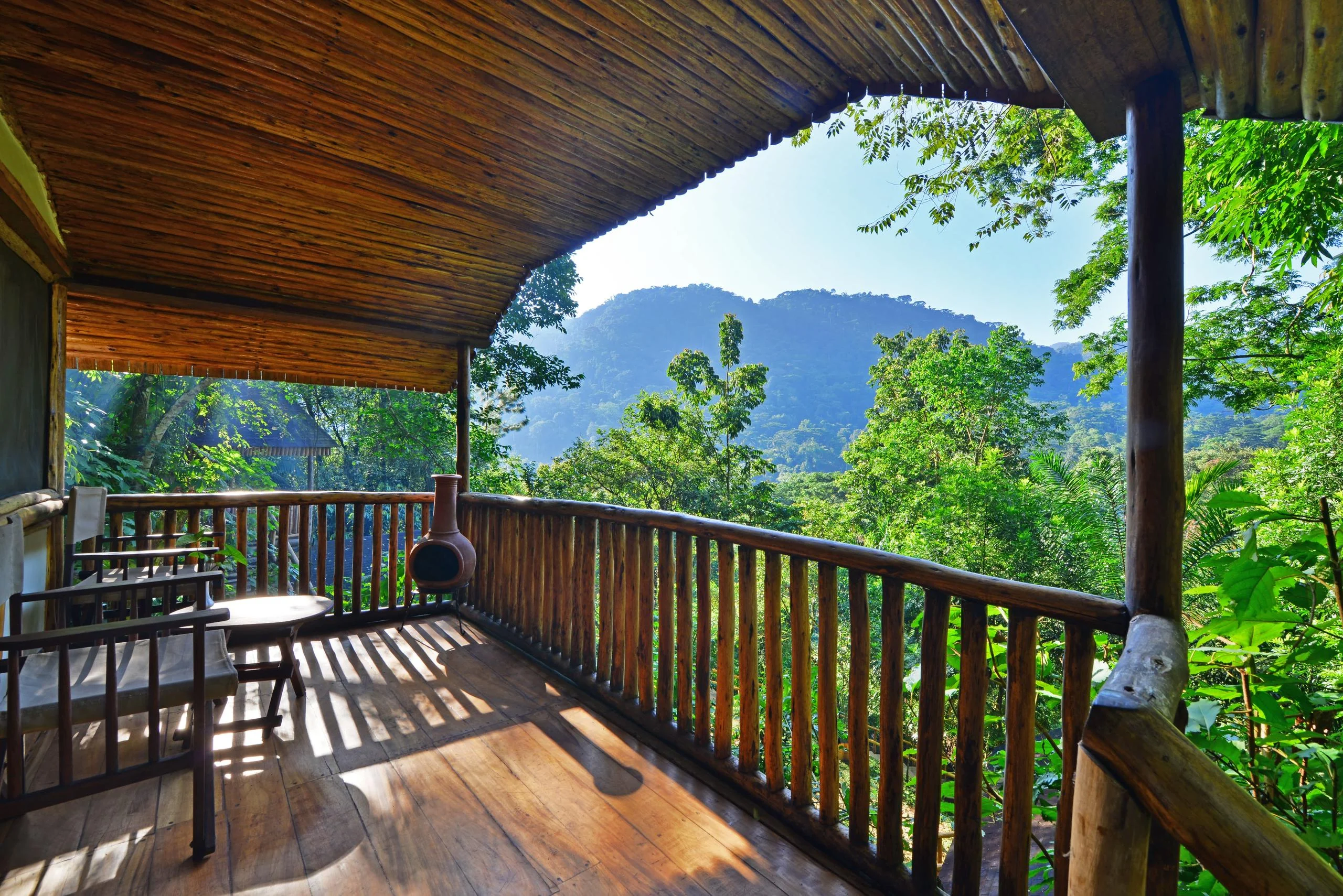 The veranda looking out over the forested hills