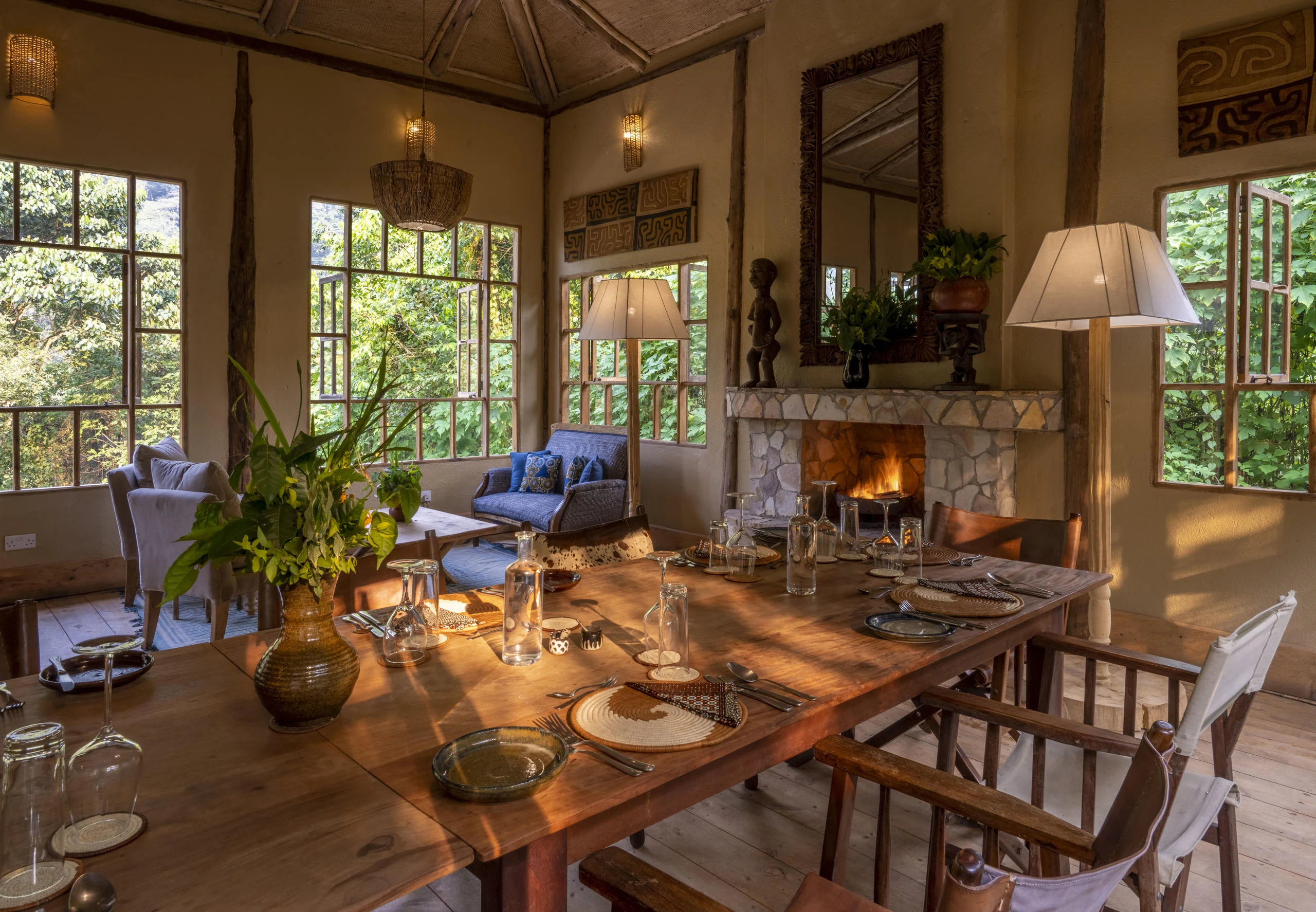 The dining table set beside the fireplace