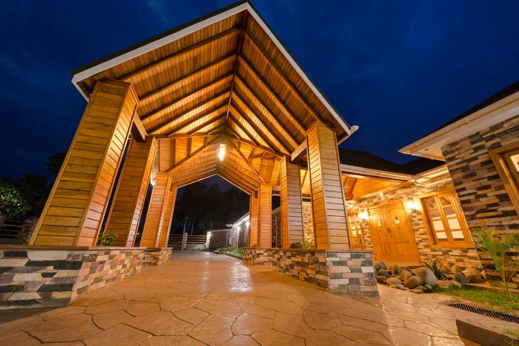 The lodge entrance lit at dusk