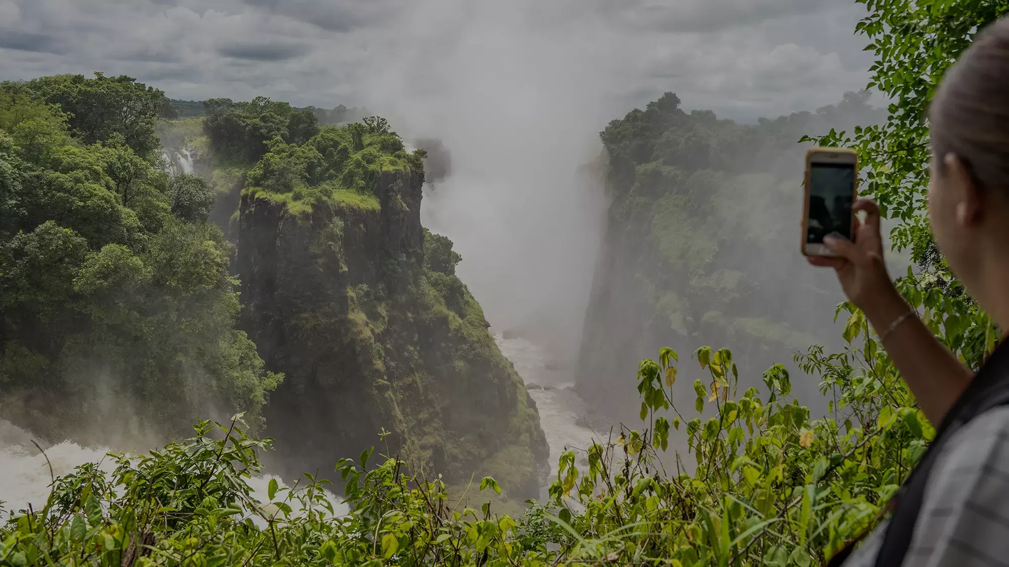 A guest photographing Murchison Falls