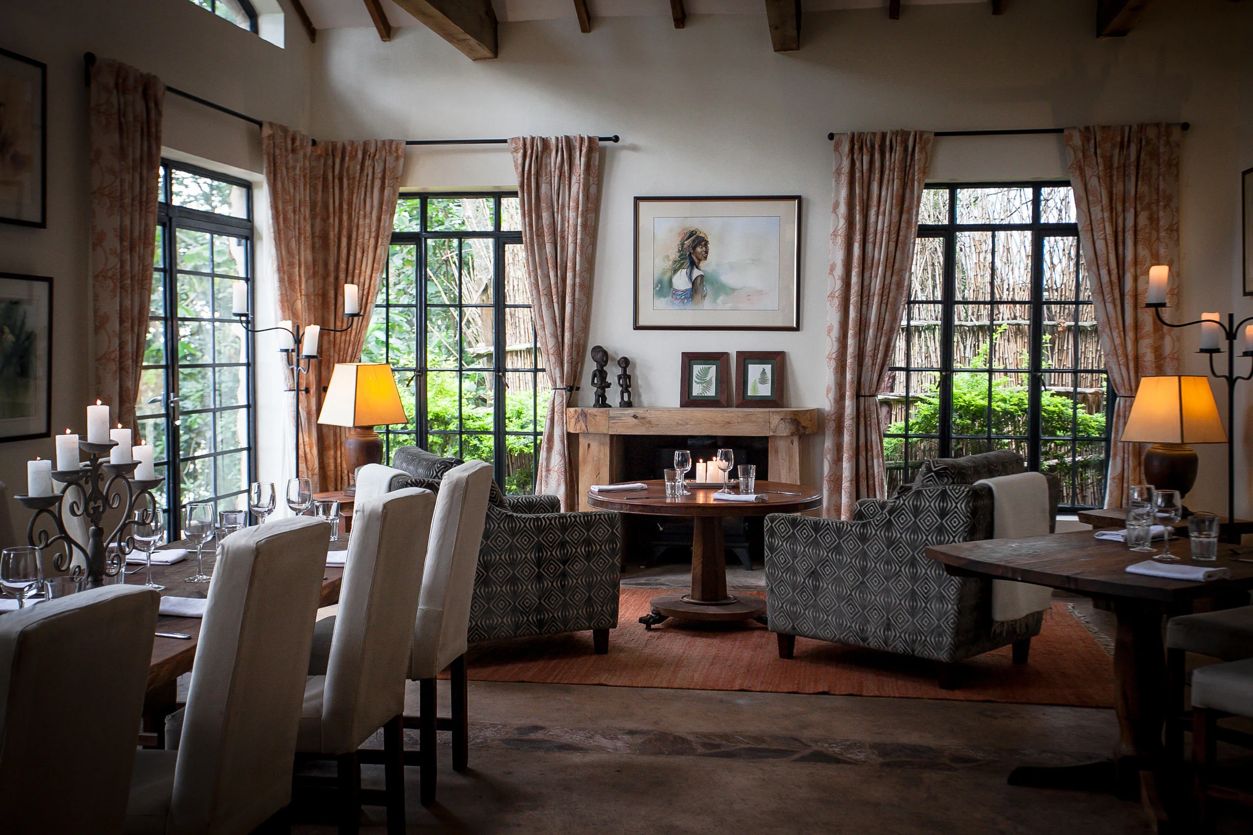 The dining room with armchairs at the tables