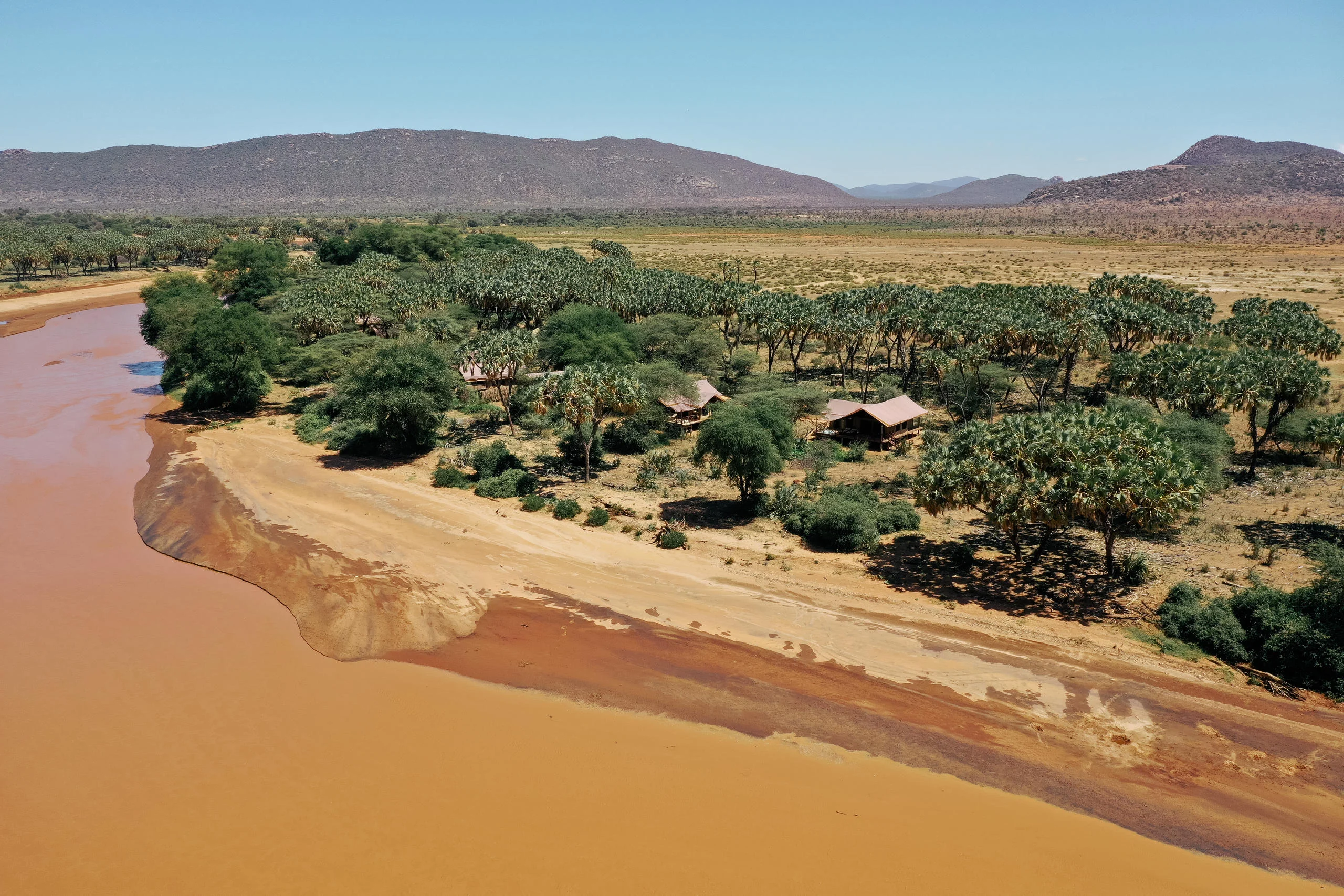 The camp on the bend of the river, from the air