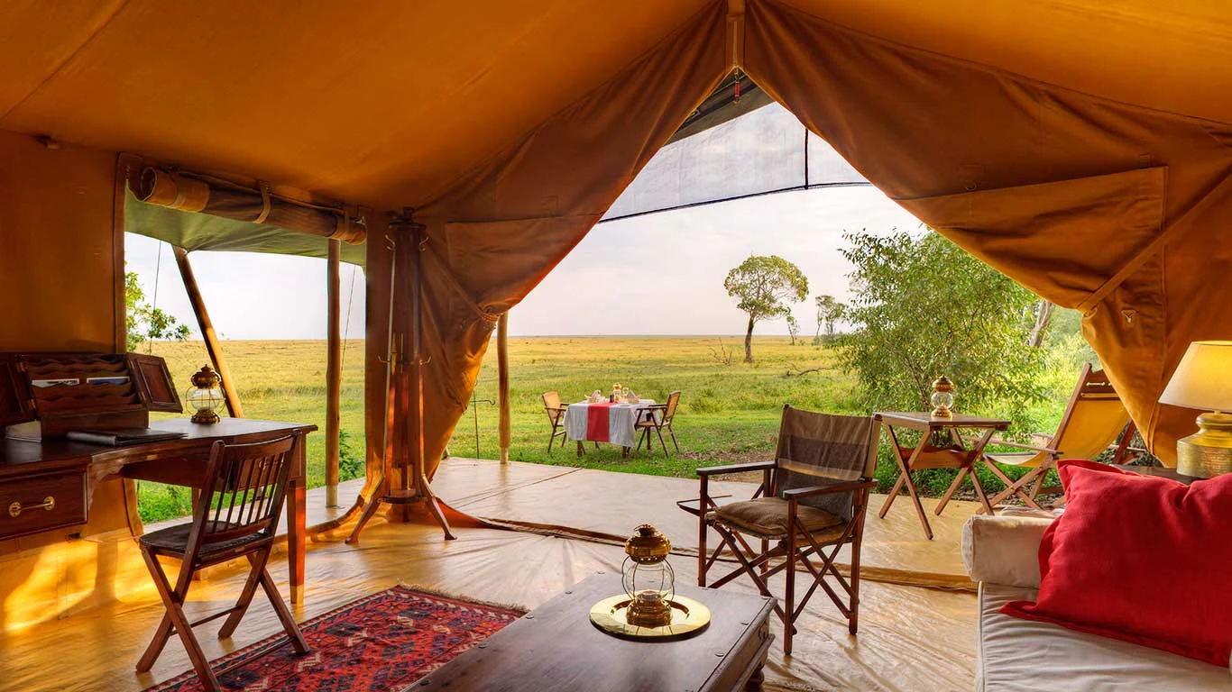 A tent interior looking out to the plains