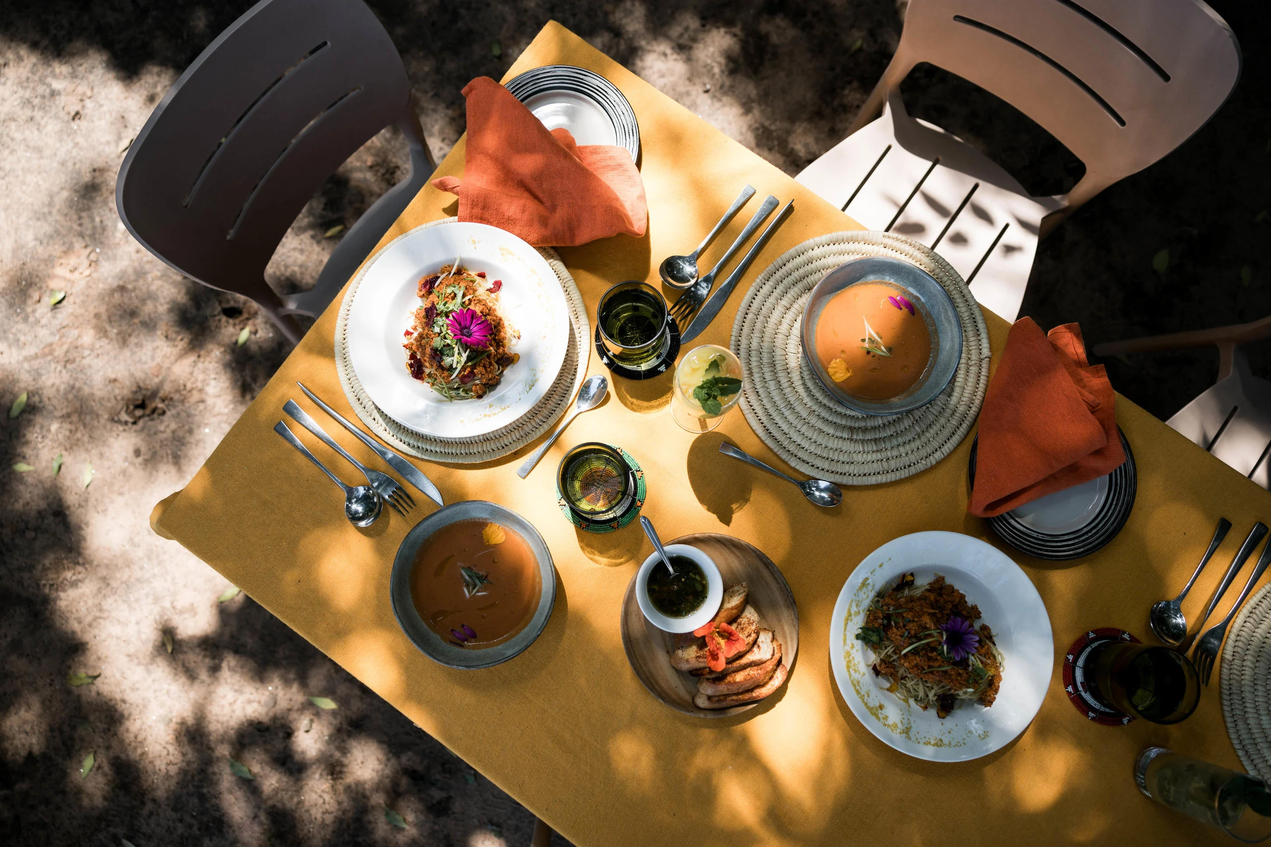 Lunch laid on a yellow cloth, from above