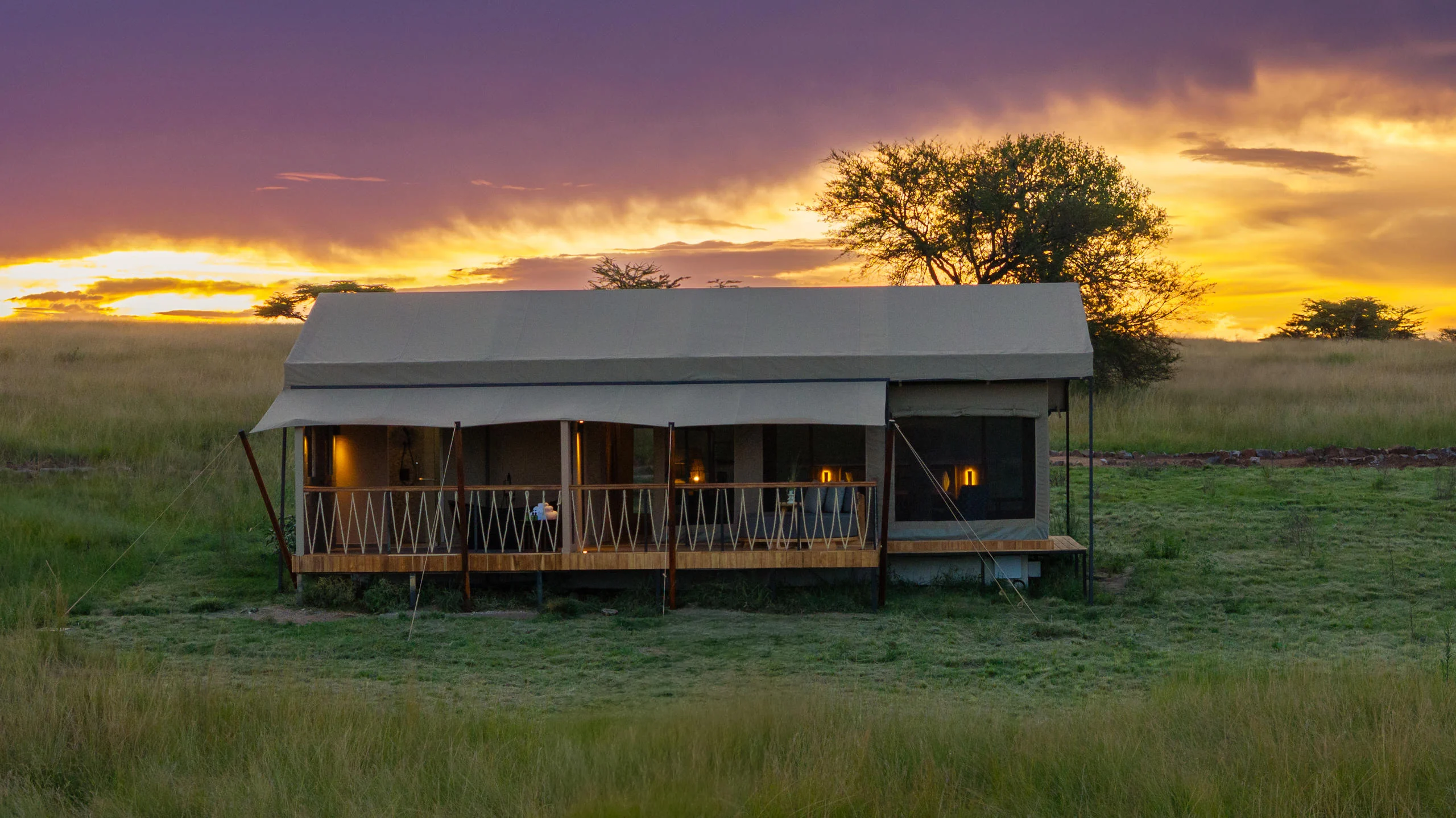 A tented suite on the plains at sunset