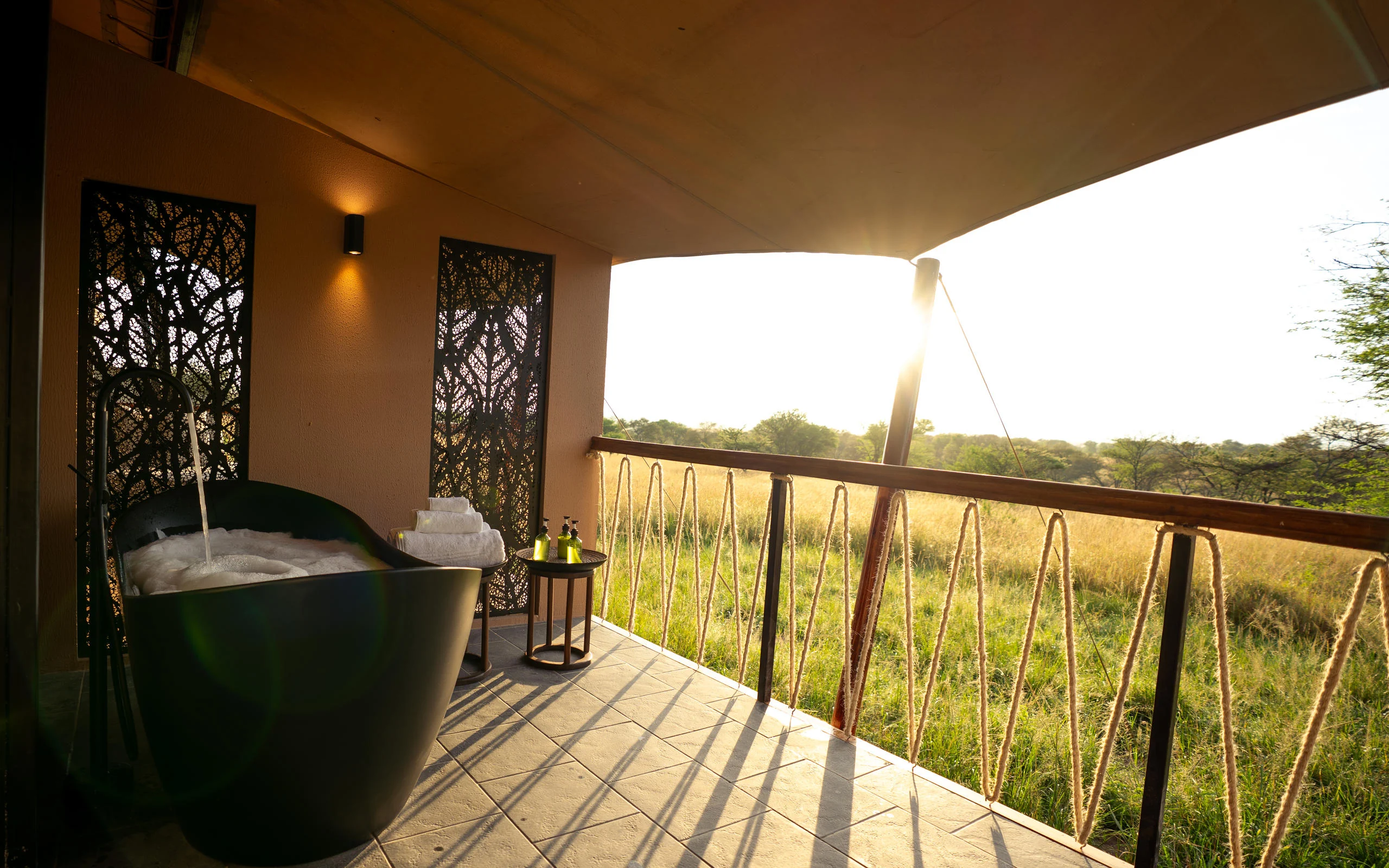 A bath on a deck looking over the plains