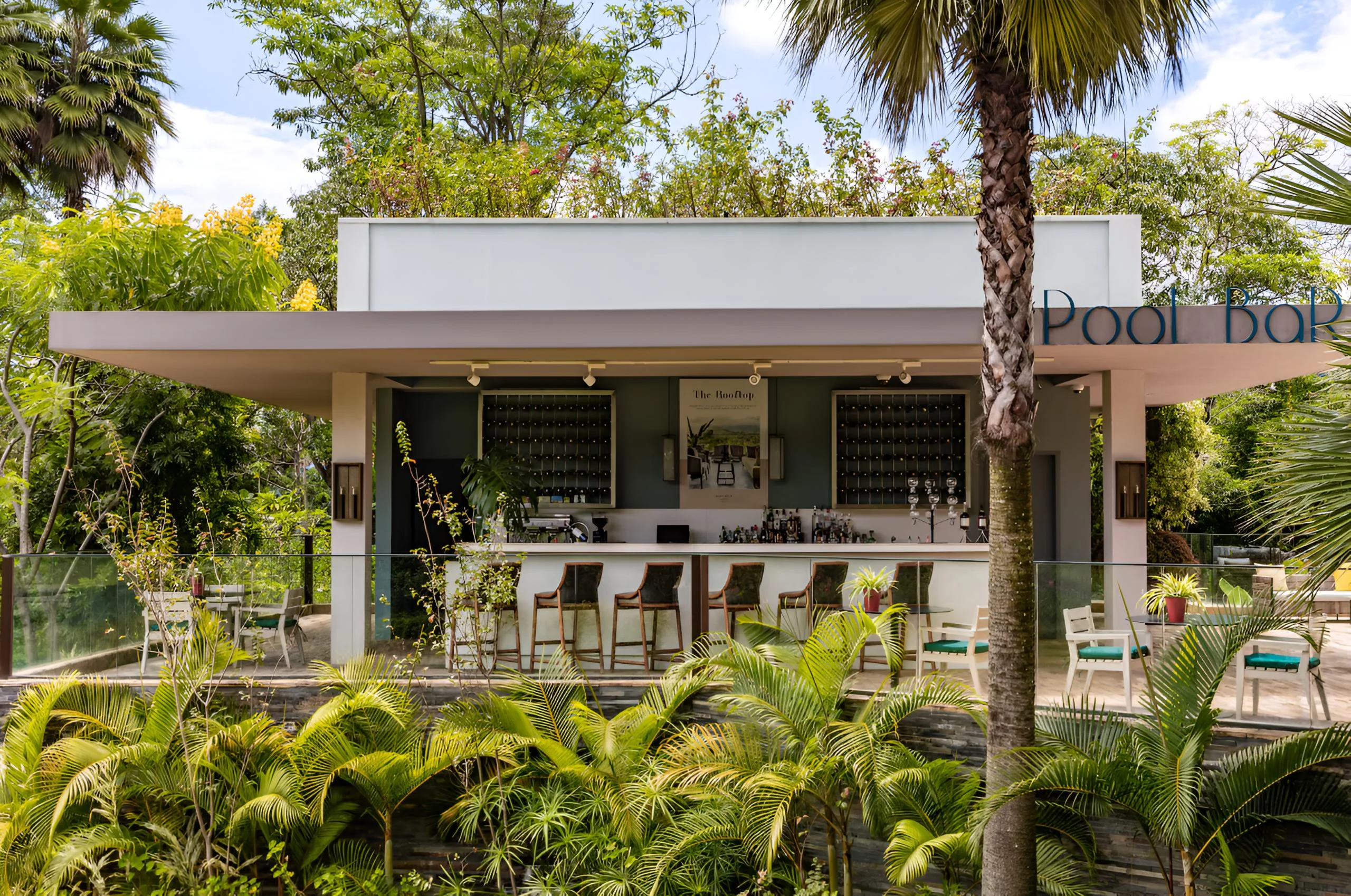The pool bar among the palms