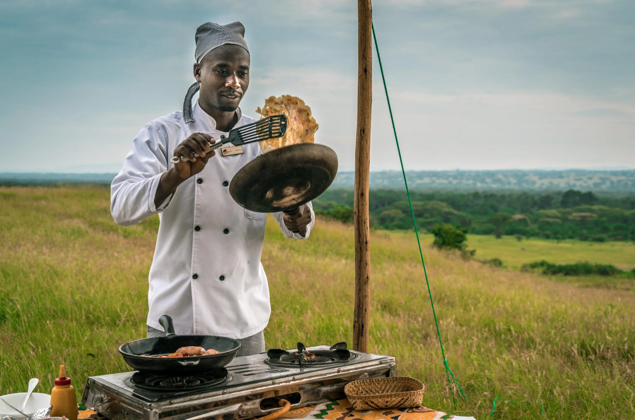 A chef cooking on the plains