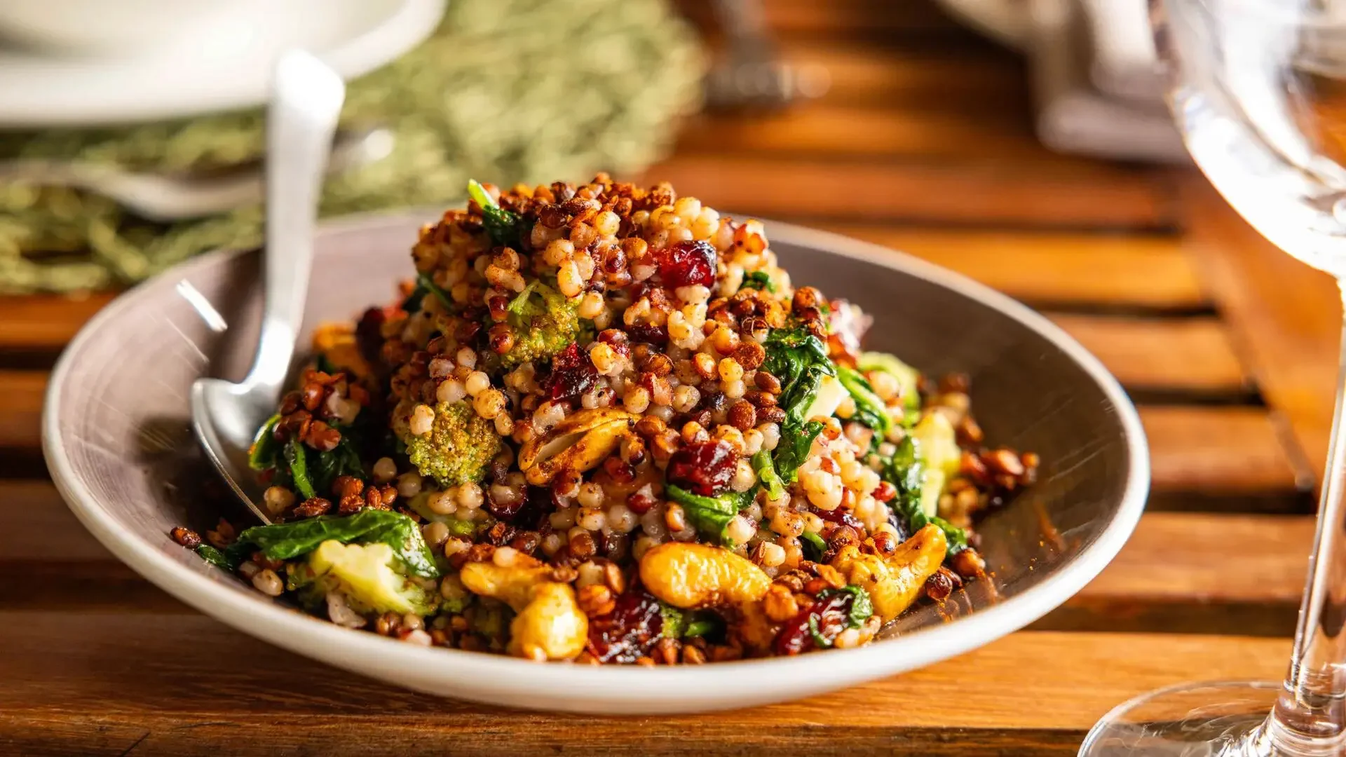 A salad dish on a dining table