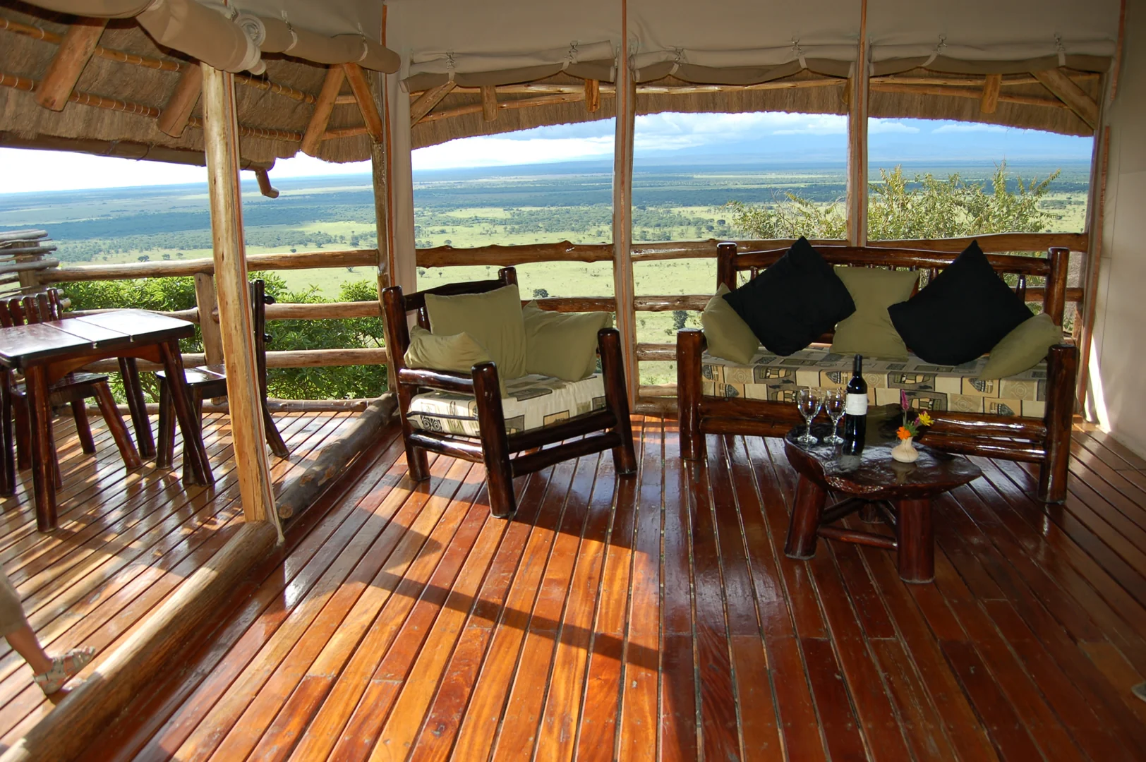The veranda with a table laid, looking over the Rift Valley