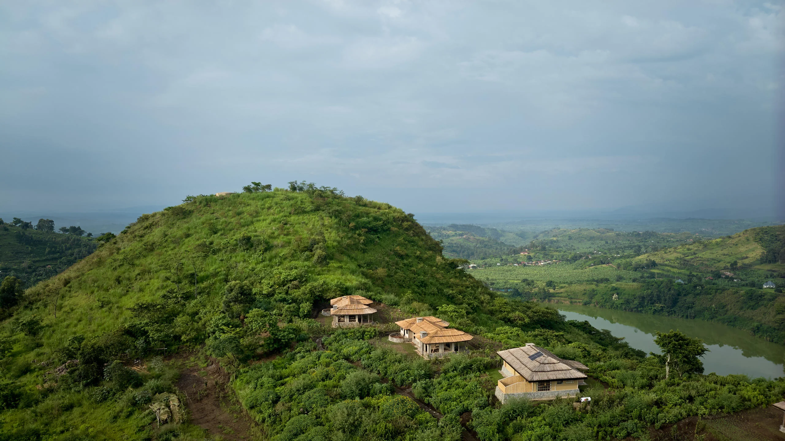 The lodge's cottages on a hilltop above the crater lakes