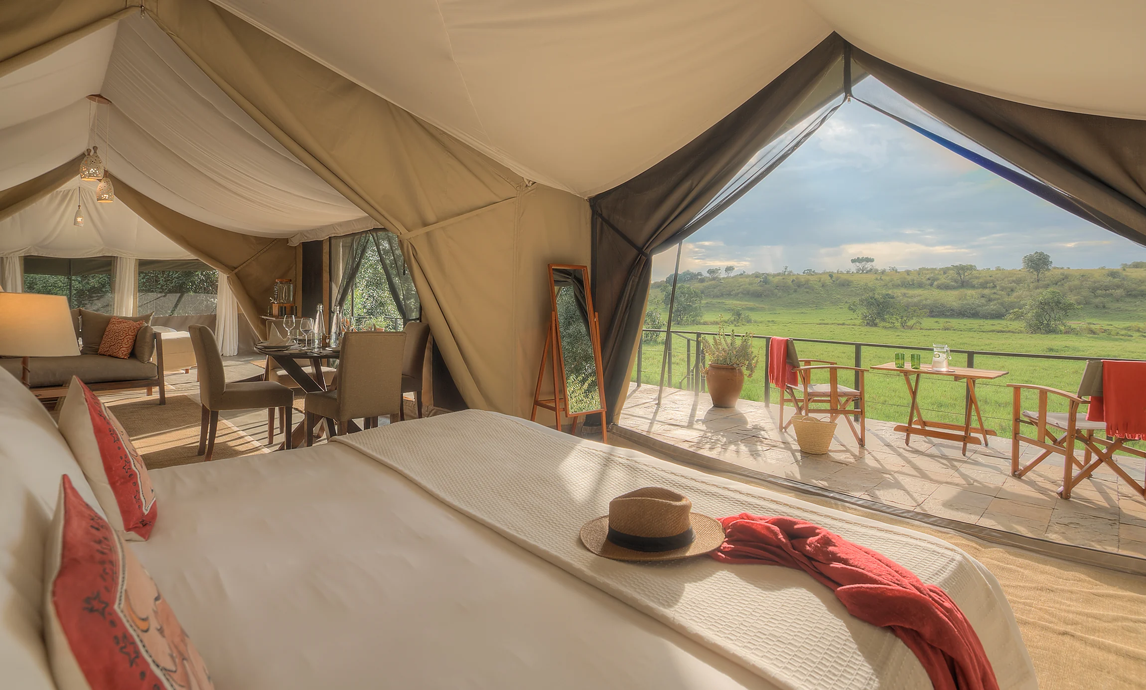 A tent bedroom with the plains beyond