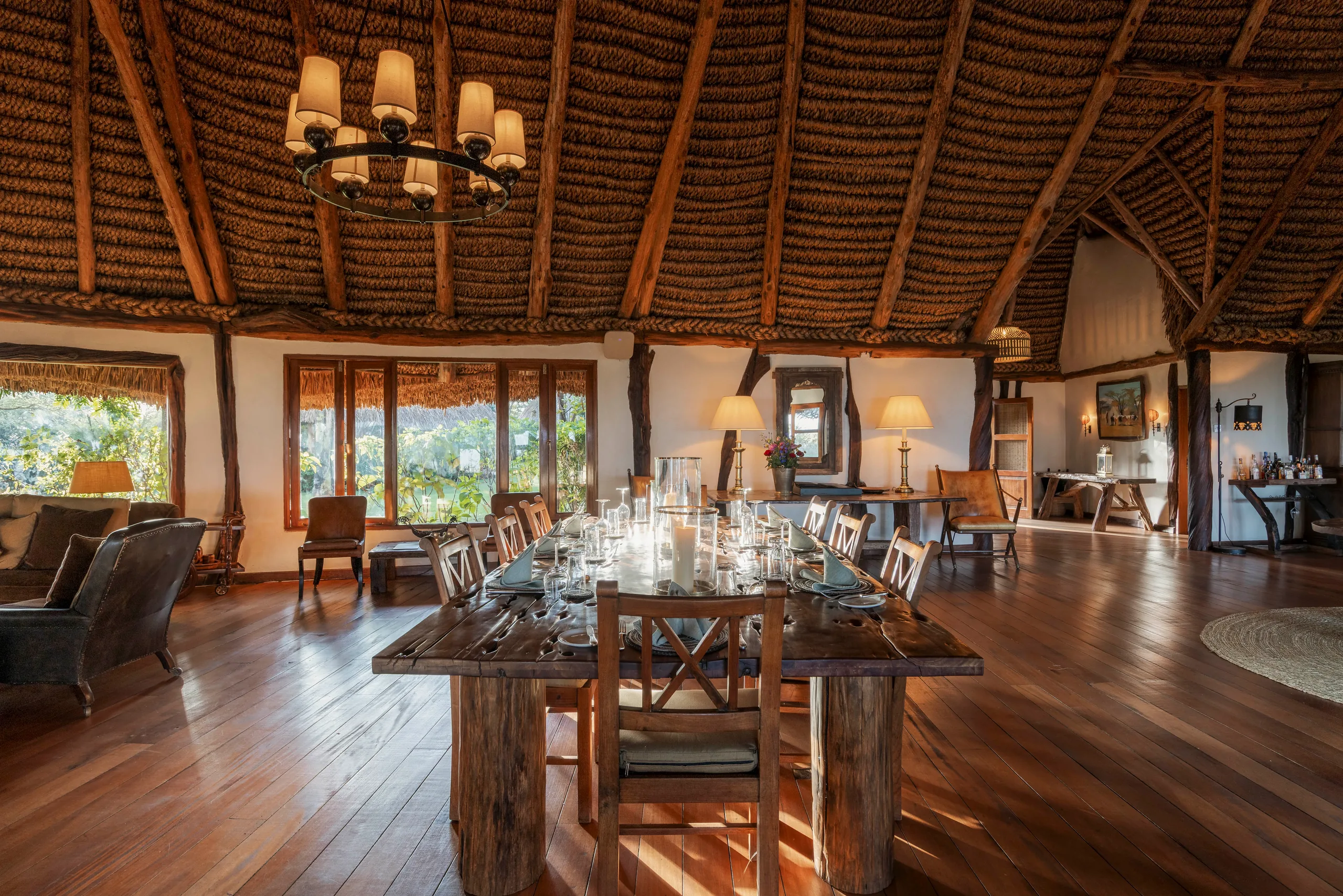 The dining room beneath its thatched roof at Kifaru House Lewa