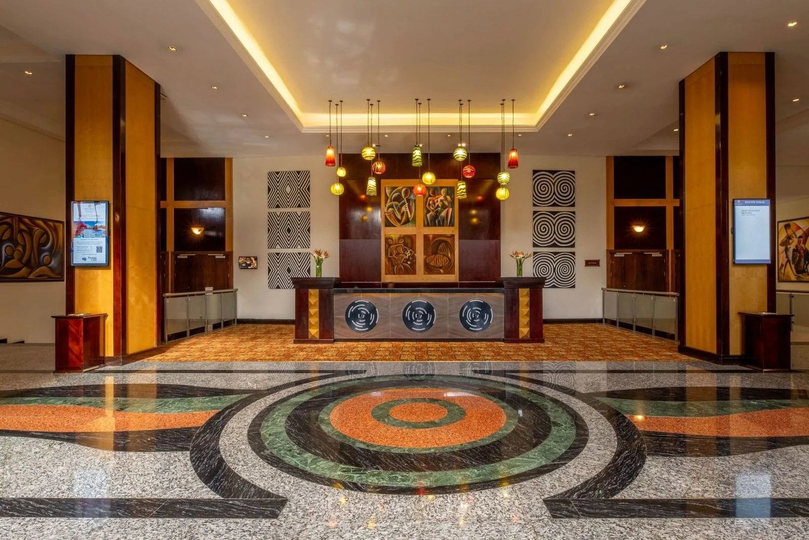 The lobby with its patterned marble floor