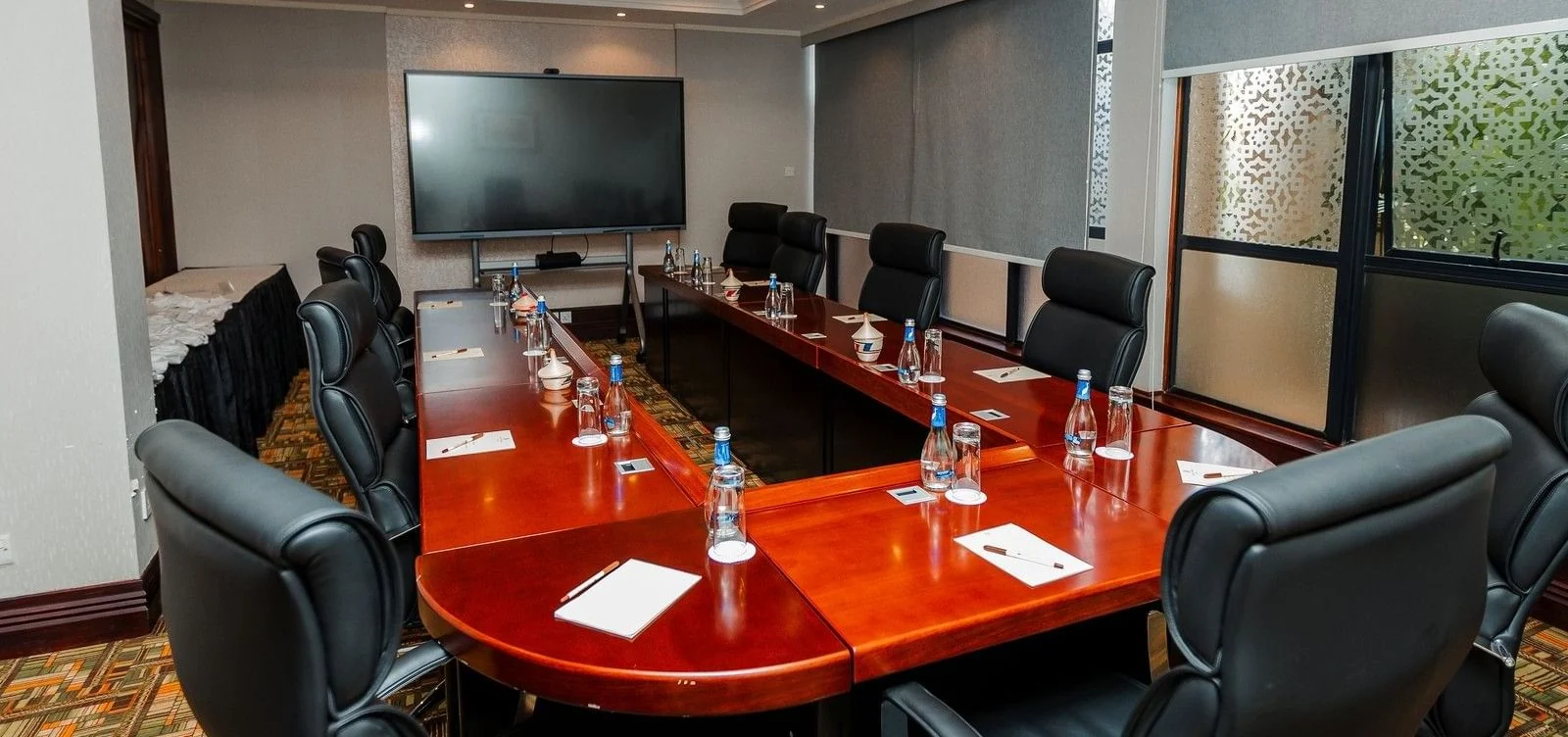 A boardroom with a long table