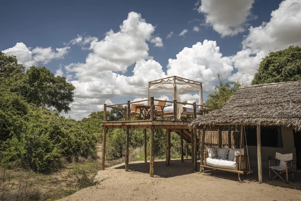 A tent on its platform under a wide sky