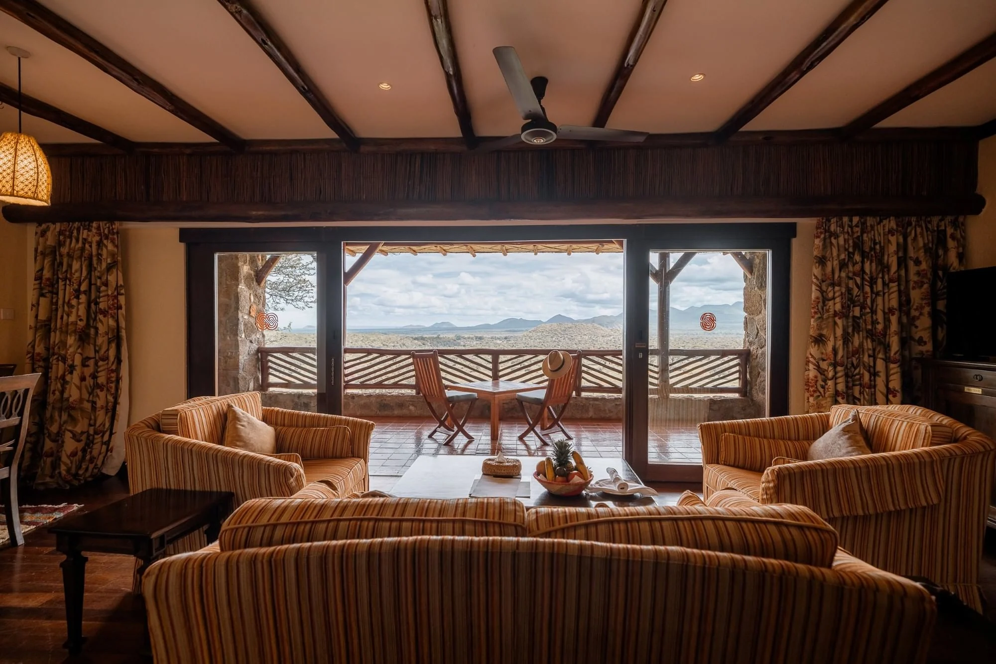 An executive suite sitting room with a view of the plains