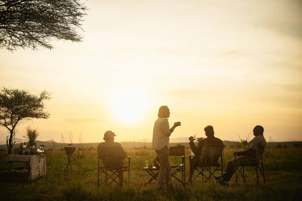 Guests at sundowners on the plains