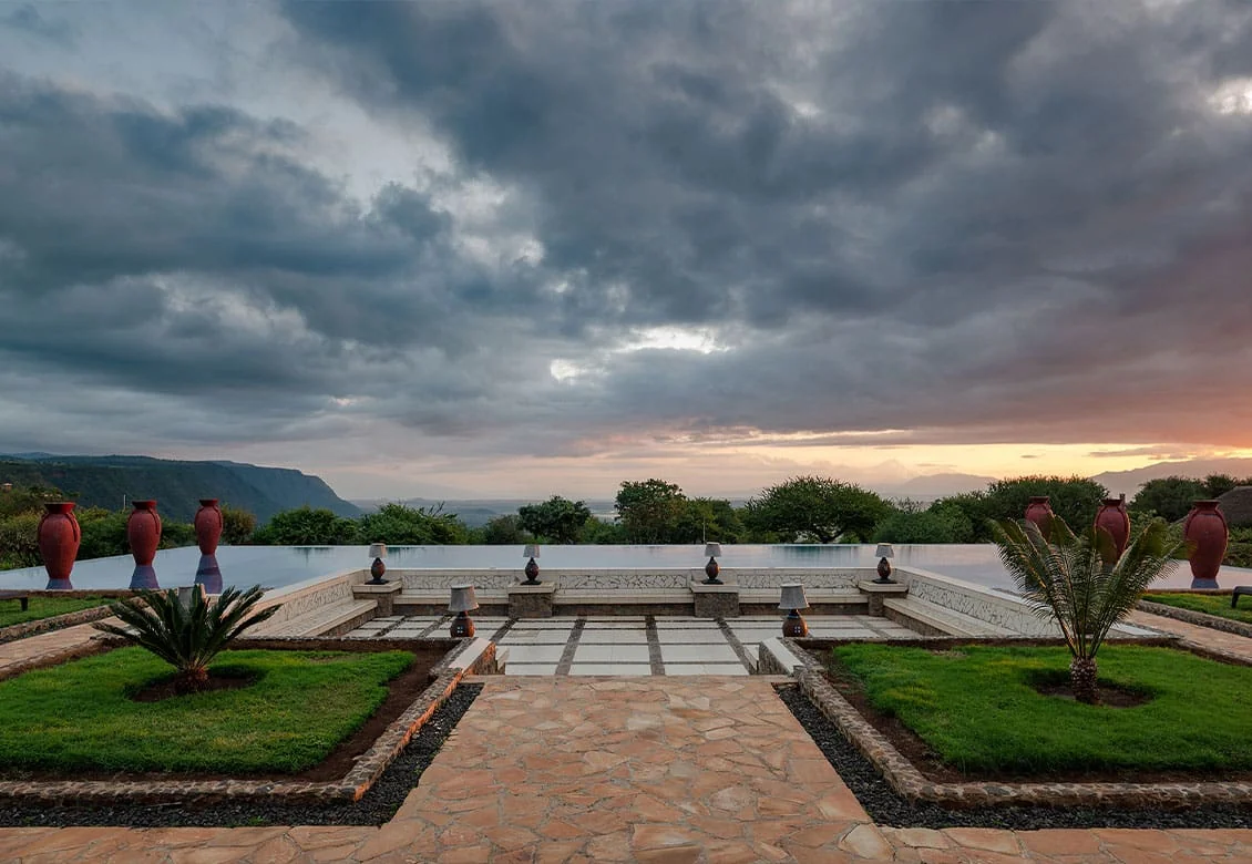 The formal garden and terrace under a stormy sky