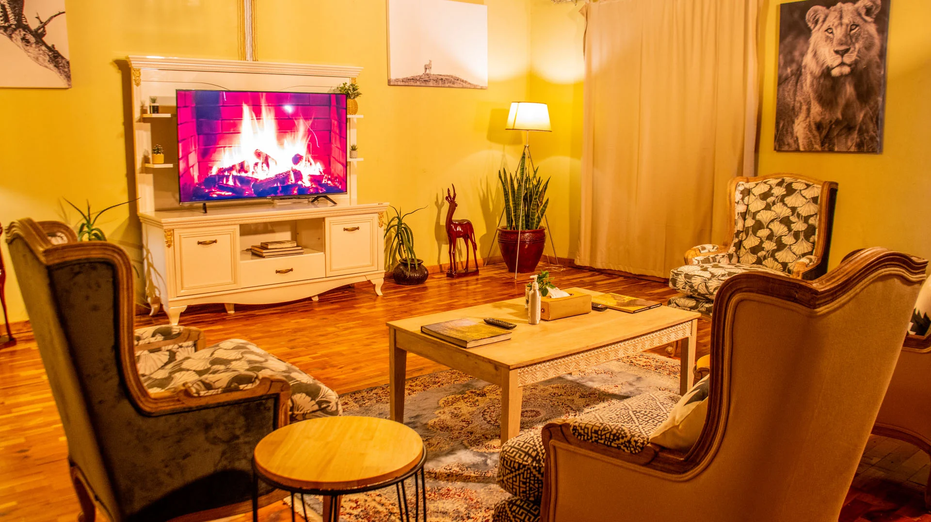 A lounge with a fireplace