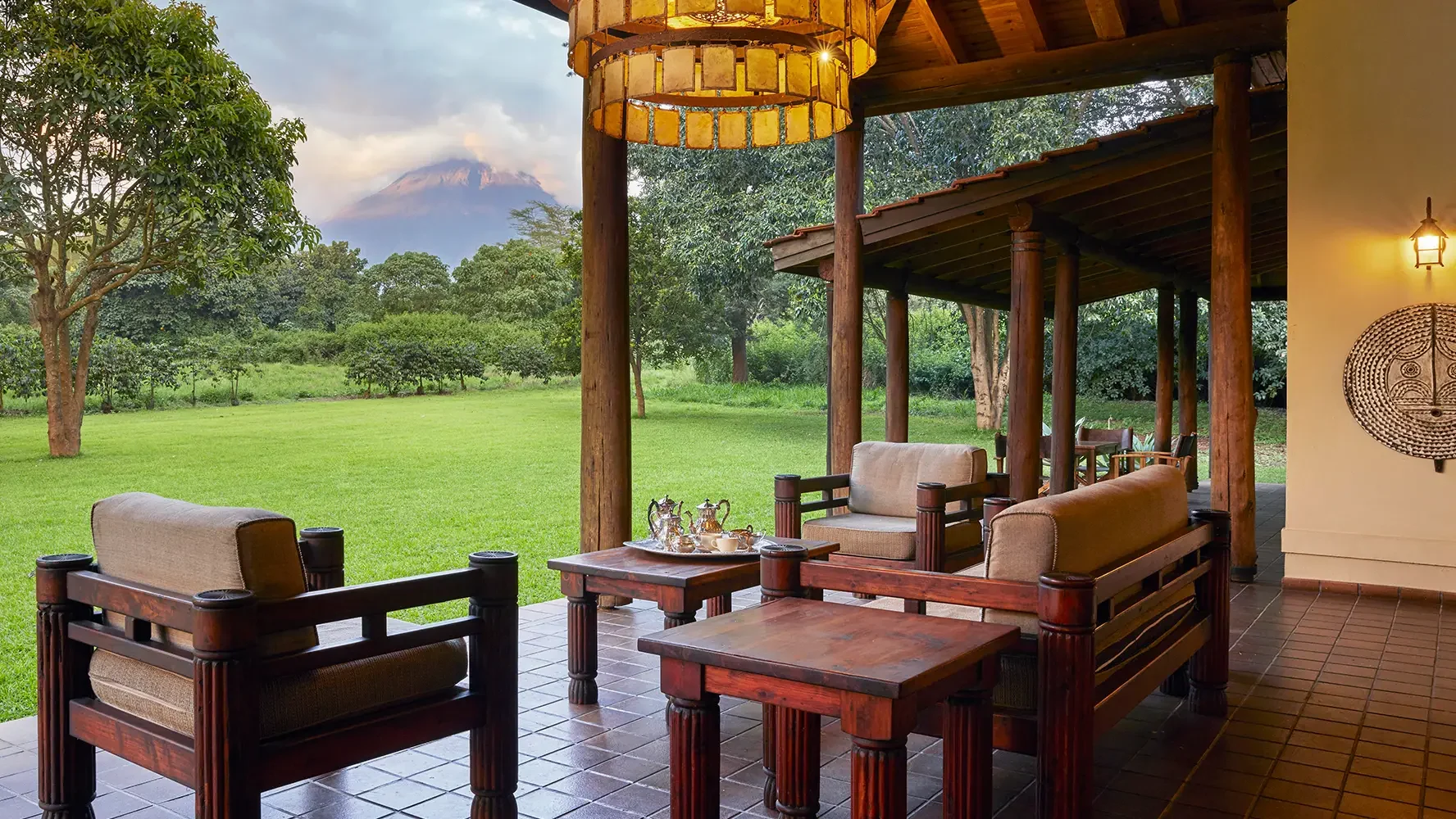 The veranda with the lawn and Mount Meru beyond