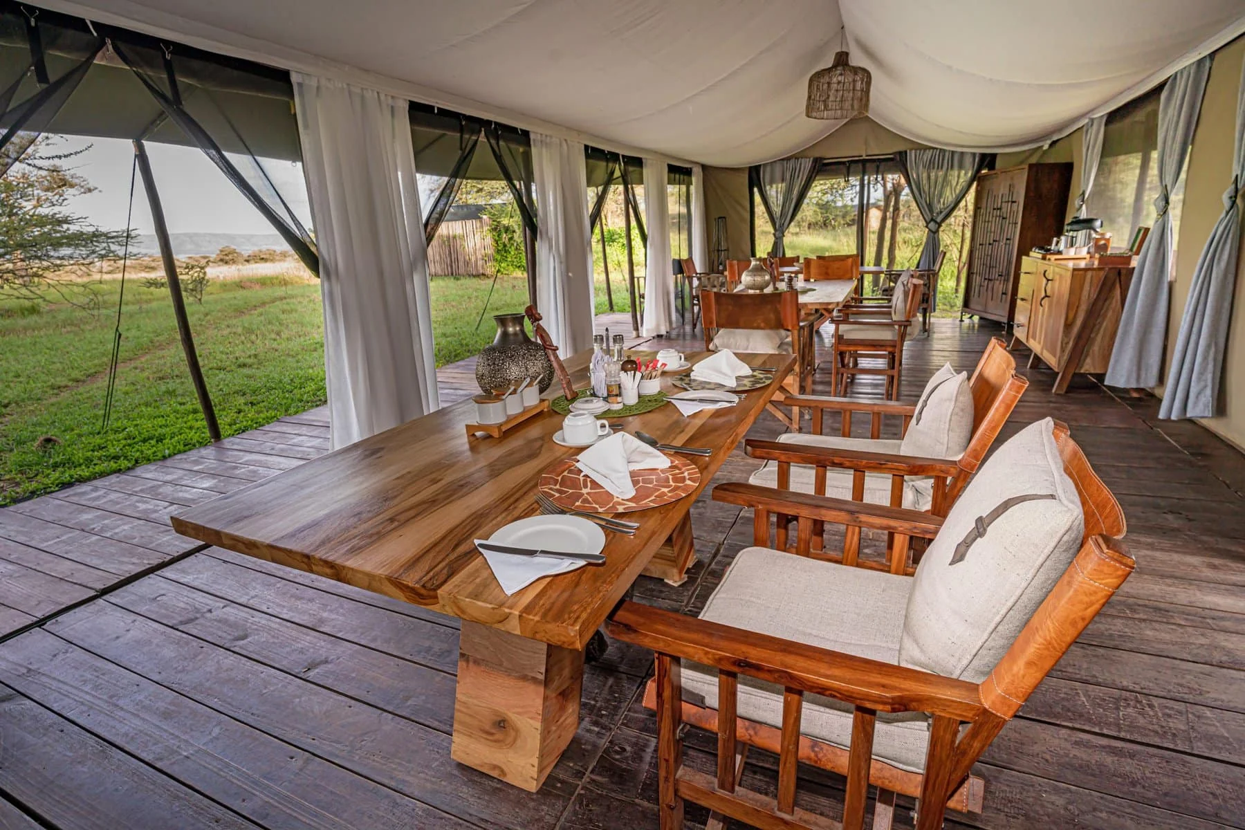 The dining tent with timber tables