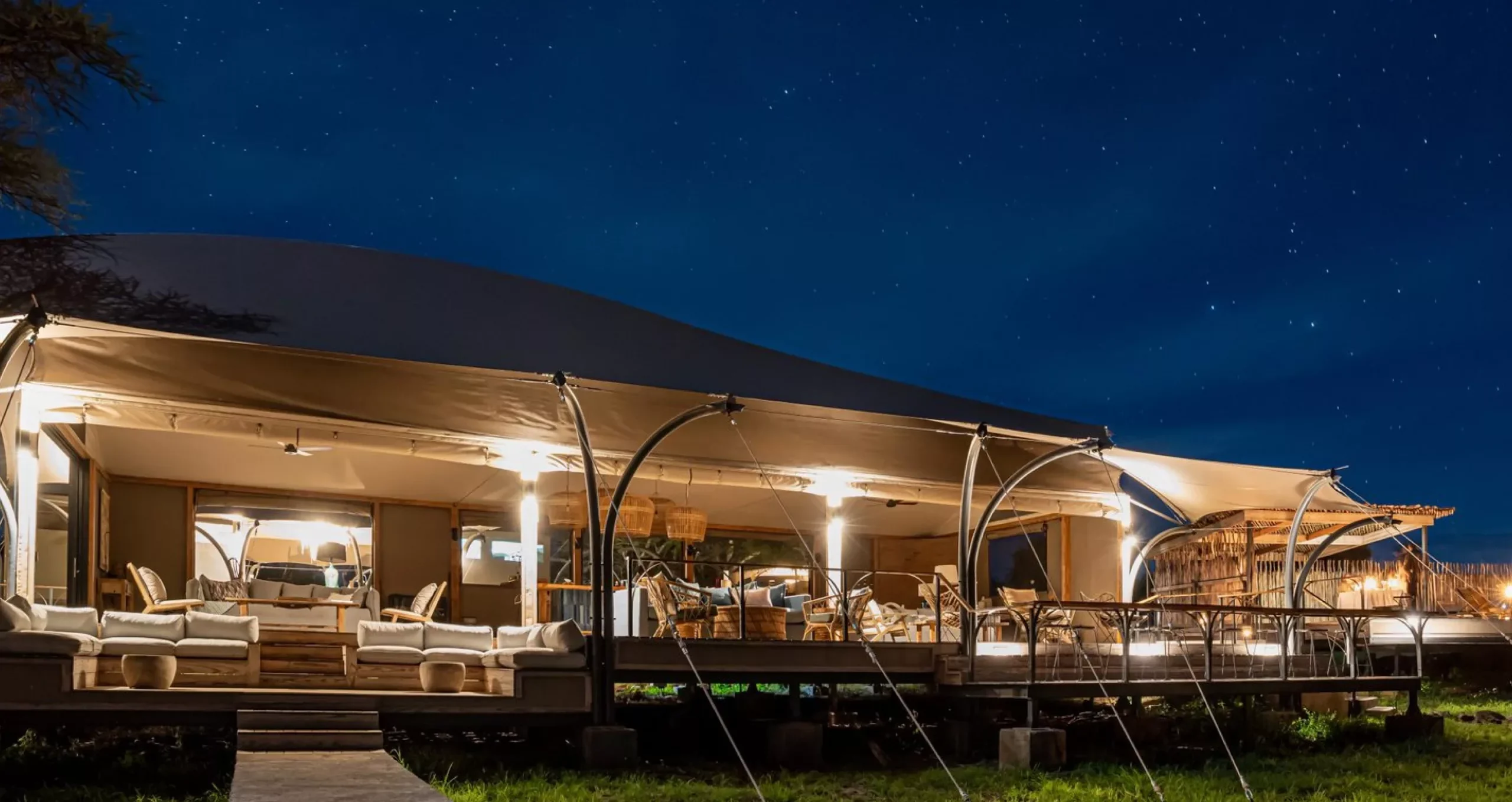 The main tent lit at night