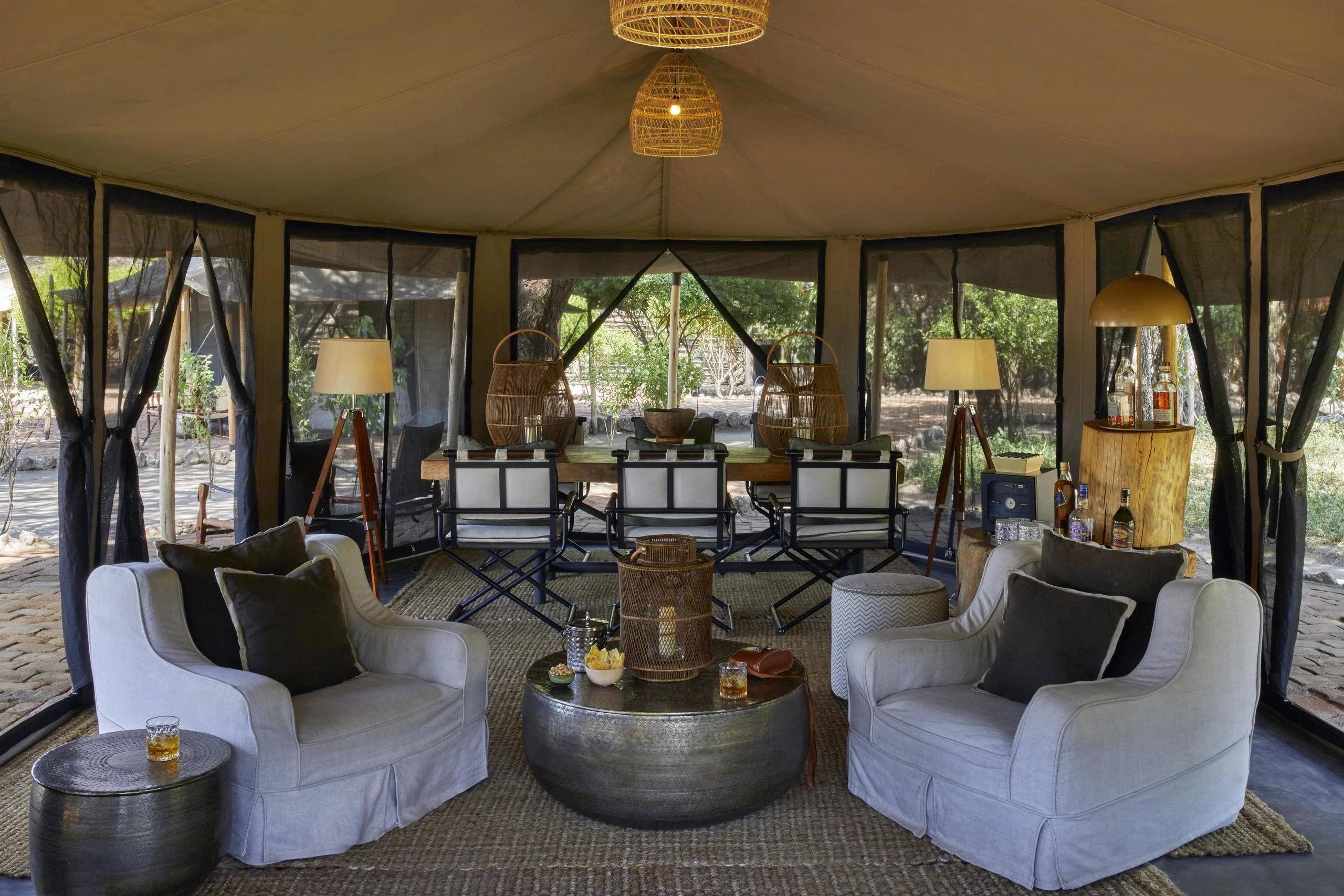 The lounge tent with pale armchairs